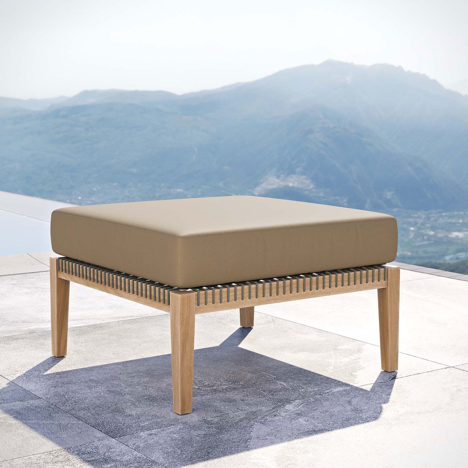 Light brown cushion teak patio ottoman placed by an infinity pool for resort style lounging || EEI-5854-GRY-LBR || front_angle_room