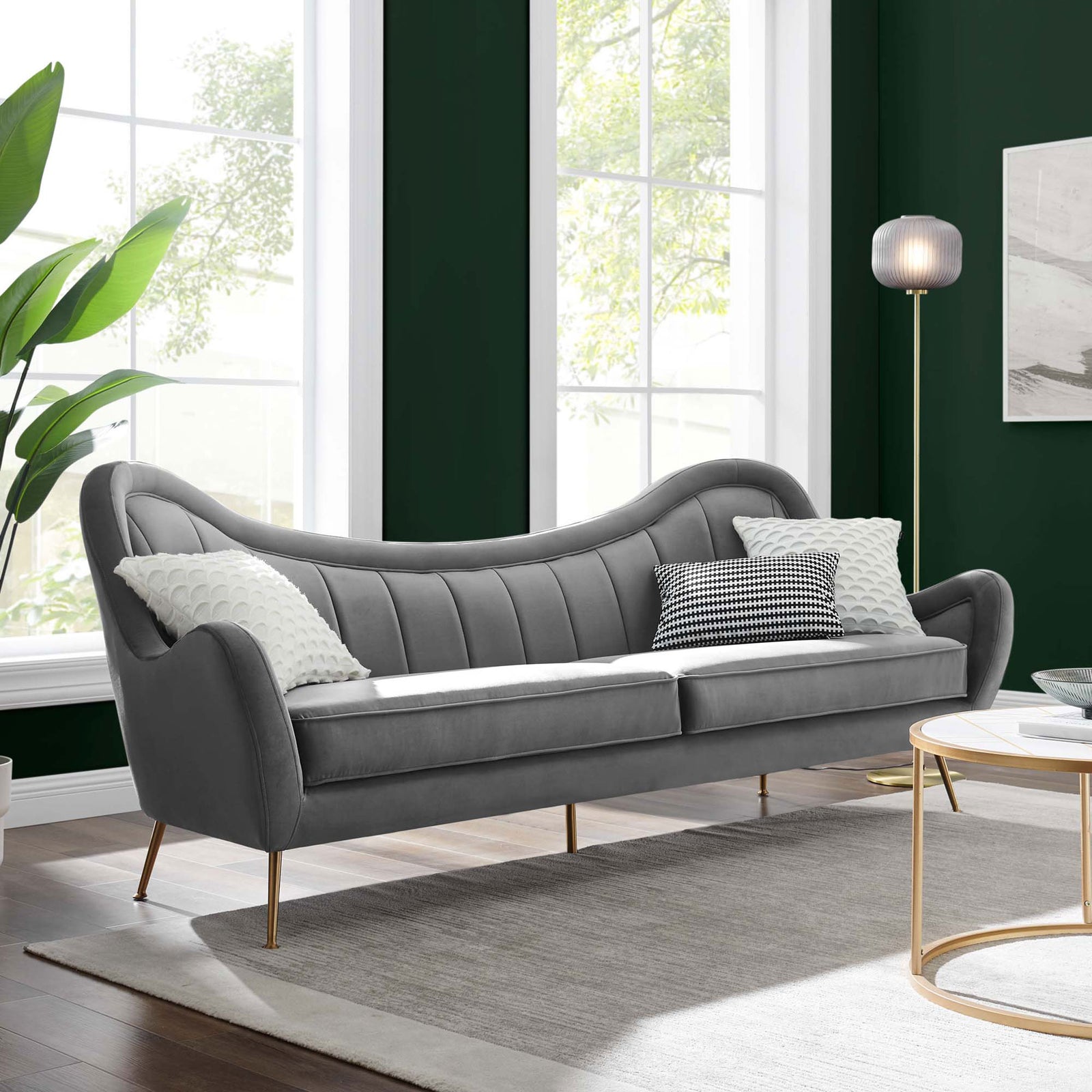 Gray velvet Cheshire sofa with channel tufting and gold legs in a chic living room || EEI-5874-GRY || front_angle_room