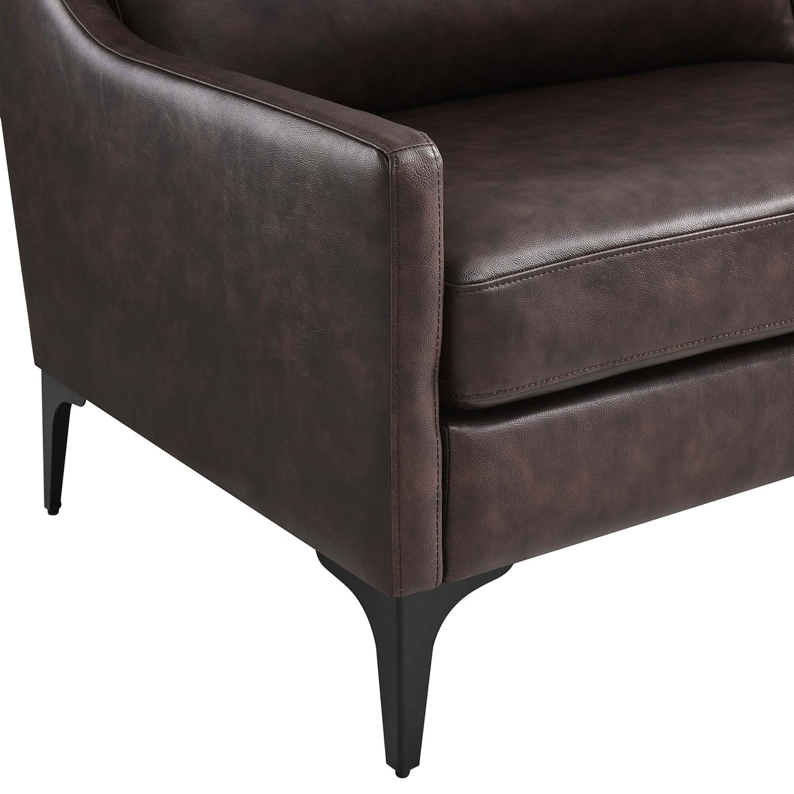 Detail of the brown leather arm and slim black metal leg, highlighting refined tailoring and rich texture || EEI-6018-BRN || leg_studio
