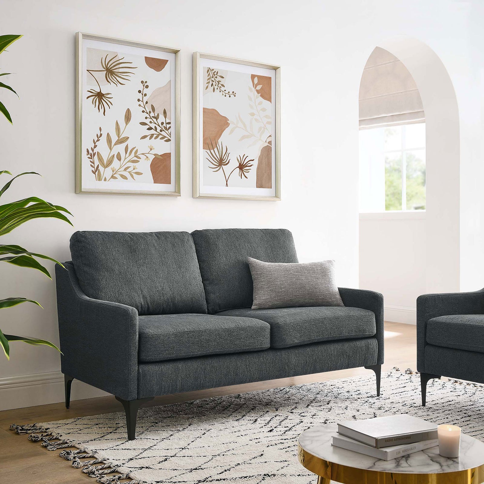 Corland charcoal loveseat in a bright living room with modern artwork, rug, and soft neutral accents || EEI-6021-CHA || front_angle_room