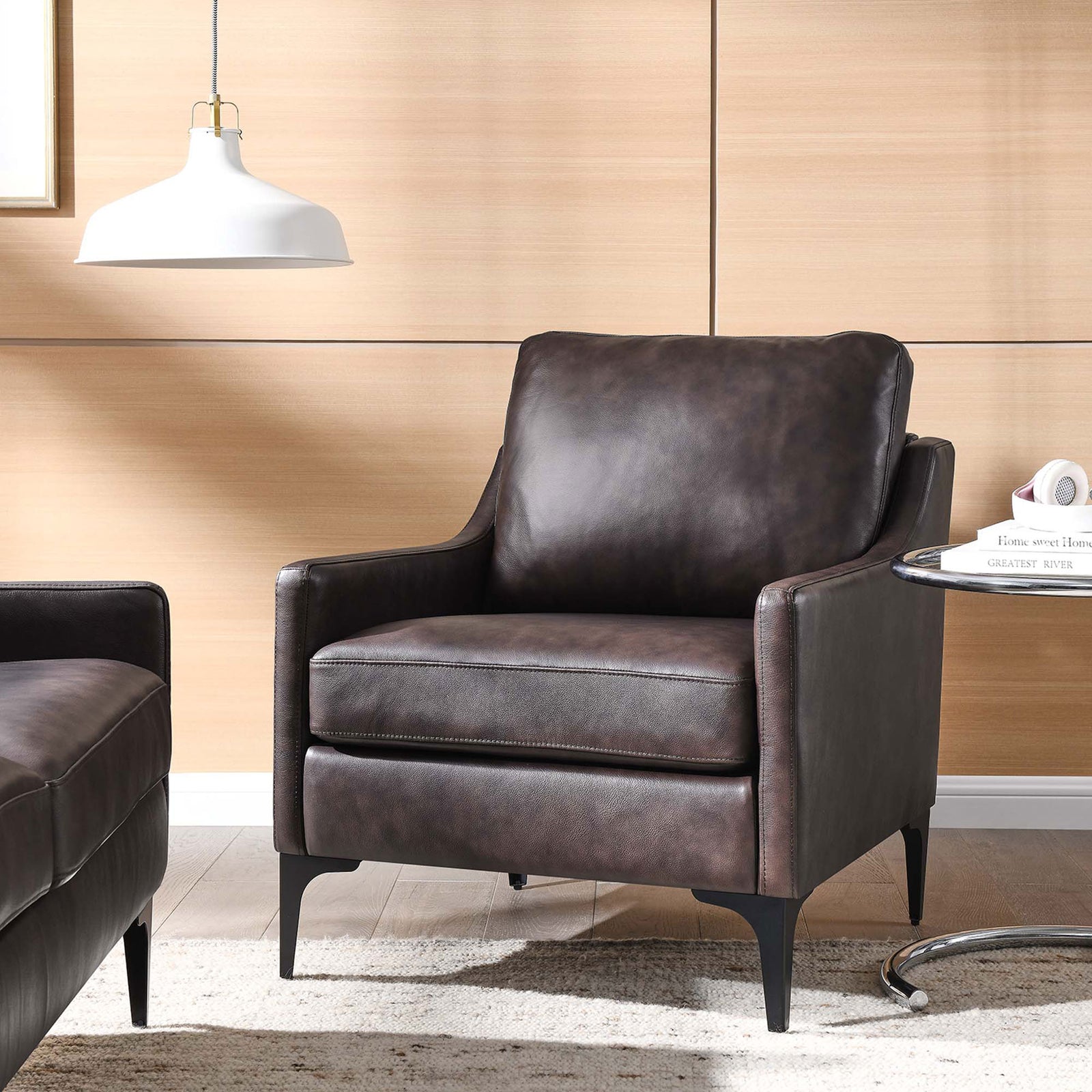 Sophisticated brown leather armchair adds warm, modern style with plush cushions and slim metal legs || EEI-6022-BRN || front_angle_room