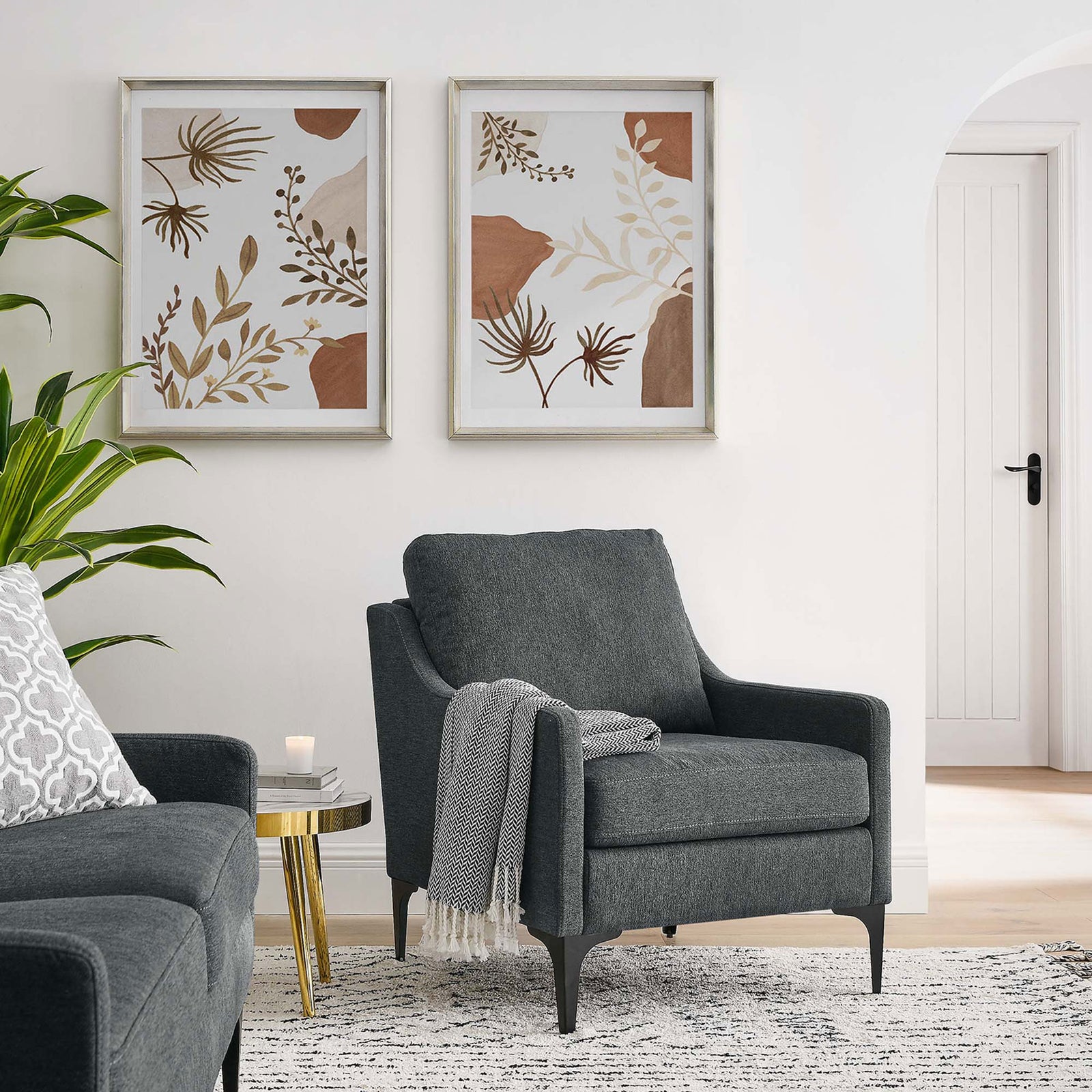 Mid-century armchair anchors the living room with charcoal fabric and slim black metal legs || EEI-6023-CHA || front_angle_room