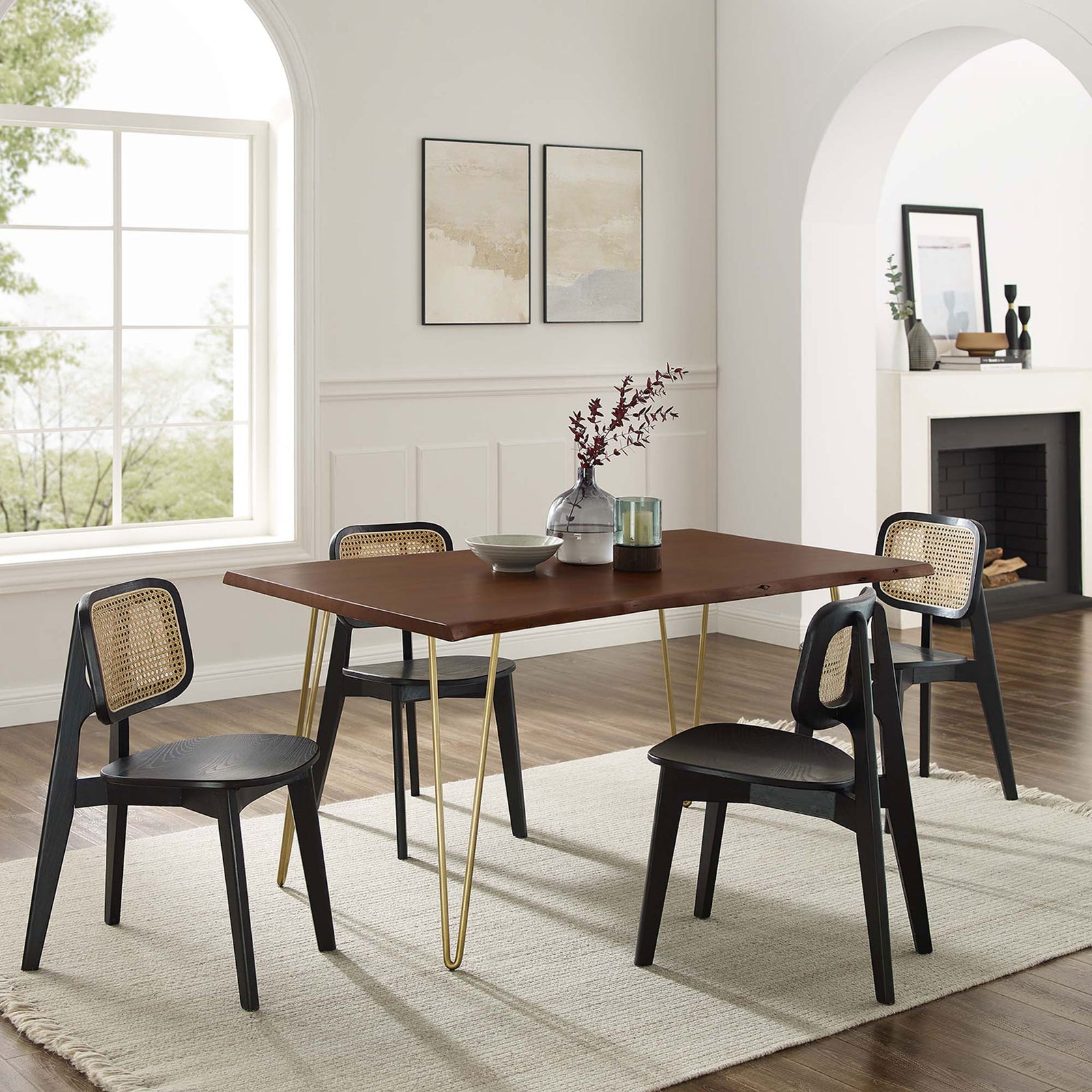 Ardor 60 inch live edge dining table styled with black chairs, neutral rug, and decor in a bright dining room || EEI-6059-GLD-WAL || front_angle_room