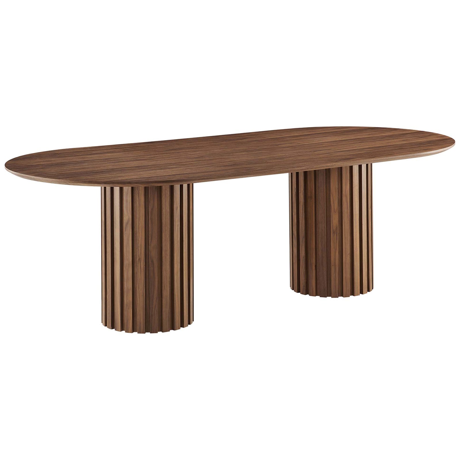 Sleek walnut dining table with elongated oval silhouette and grooved column pedestals for architectural flair || EEI-6065-WAL-SET || front_angle_studio