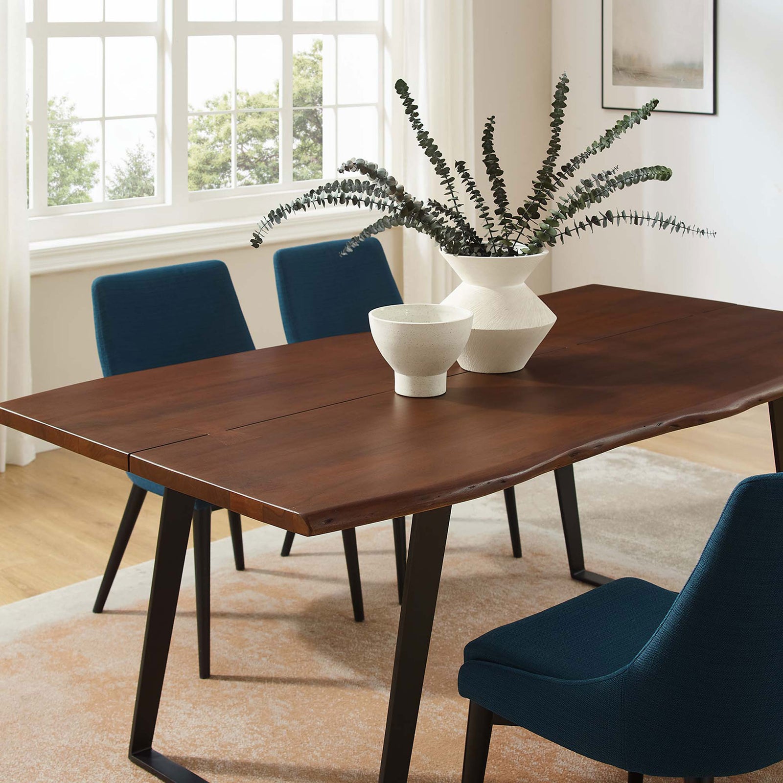 Decorated tabletop displays the live edge surface with vases and foliage in a sunlit space || EEI-6069-BLK-WAL || detail_room