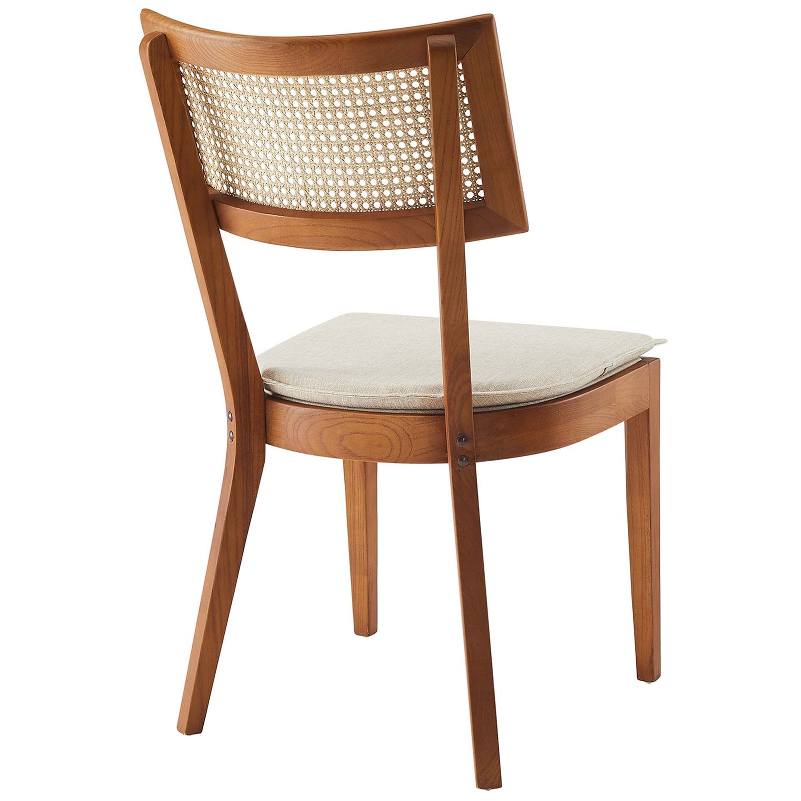 Curved walnut frame and woven rattan backrest give this dining chair light, cottage-inspired character. || EEI-6080-WAL-BEI || back_angle_studio