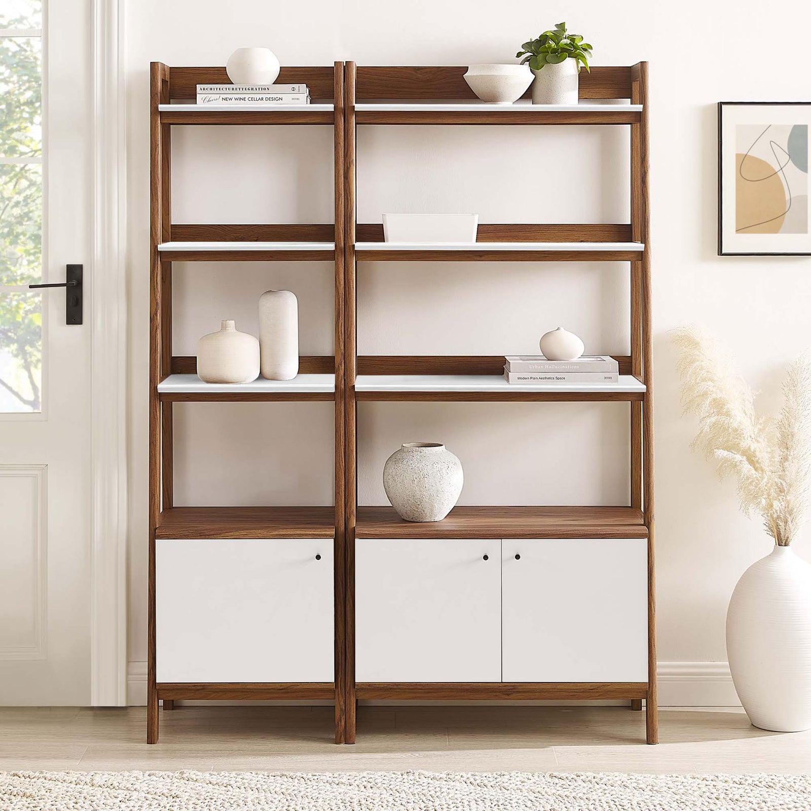 Statement-making bookshelf duo brings warm walnut grain and crisp white accents to any room || EEI-6113-WAL-WHI || front_room