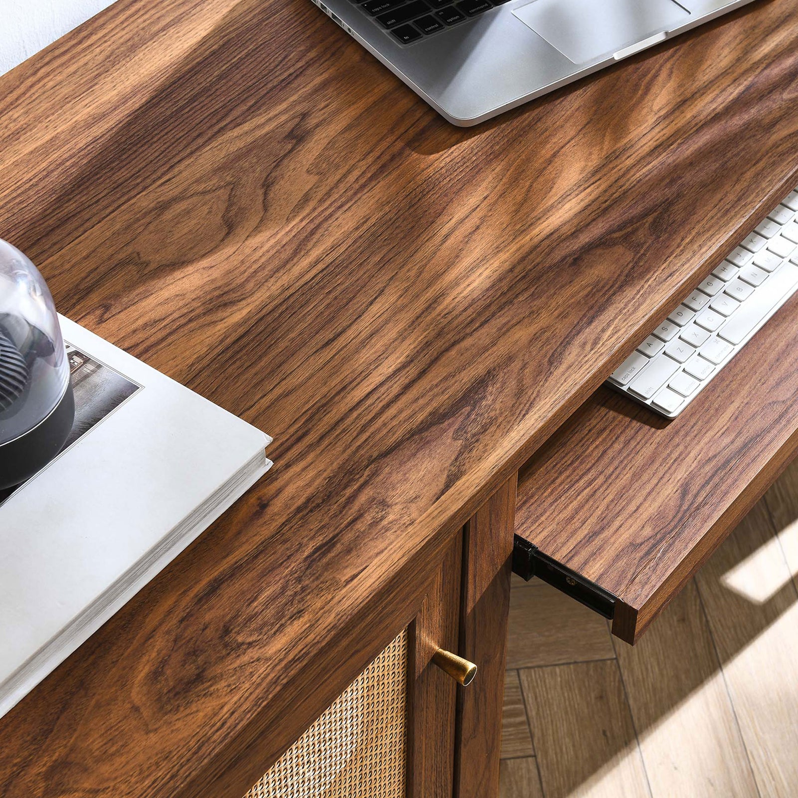 Keyboard tray glides smoothly beneath the walnut desktop beside the rattan cabinet || EEI-6116-WAL || detail_room