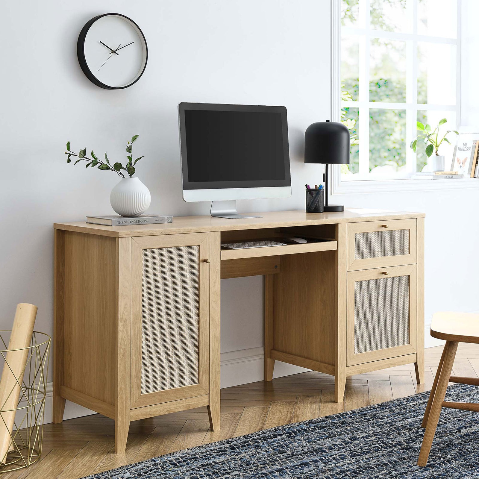 Elevate your workspace with an airy oak finish and rattan accents that blend with modern decor || EEI-6117-OAK || front_angle_room