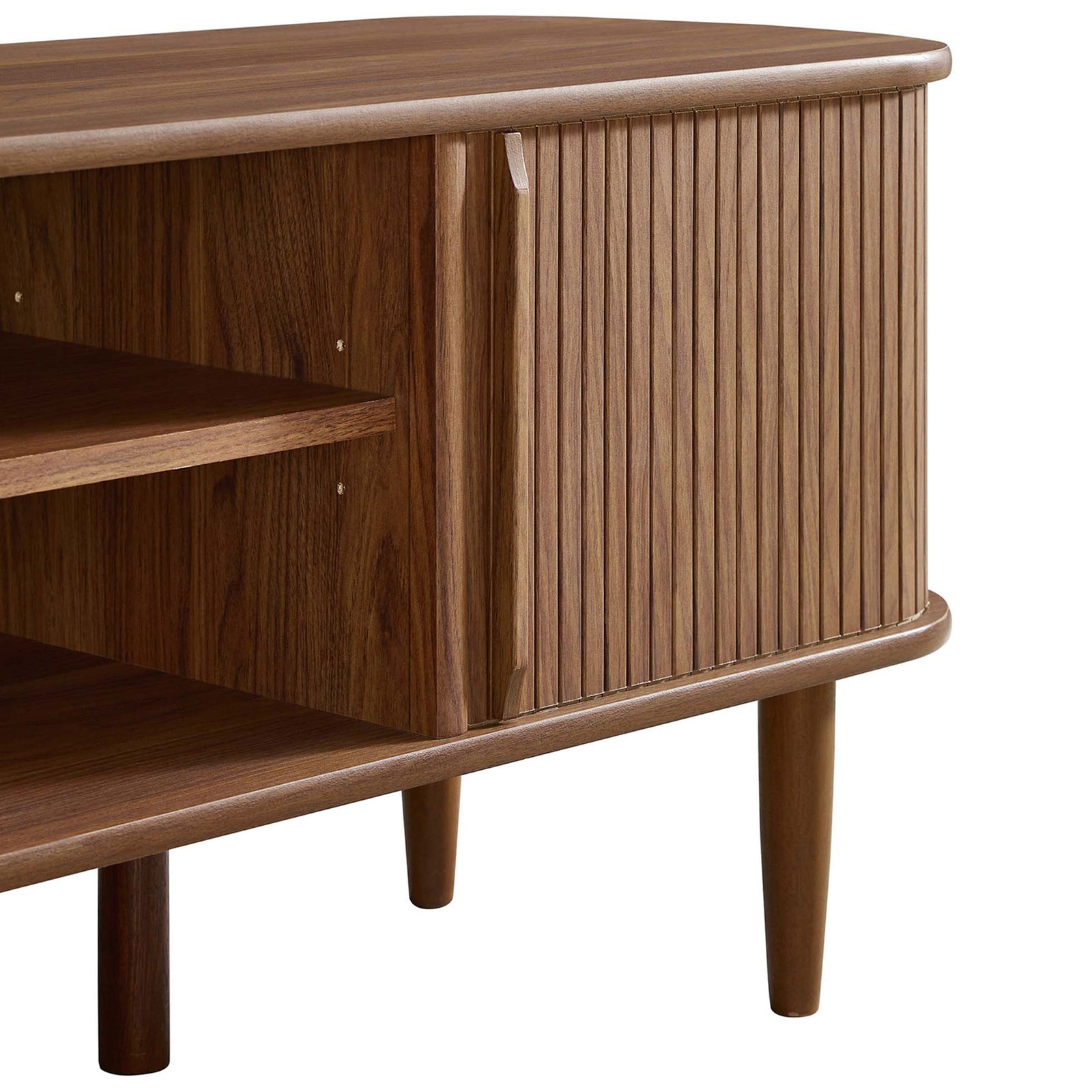 Tapered walnut legs and sculpted door pulls lend a light, airy stance to the stand || EEI-6158-WAL || storage_studio