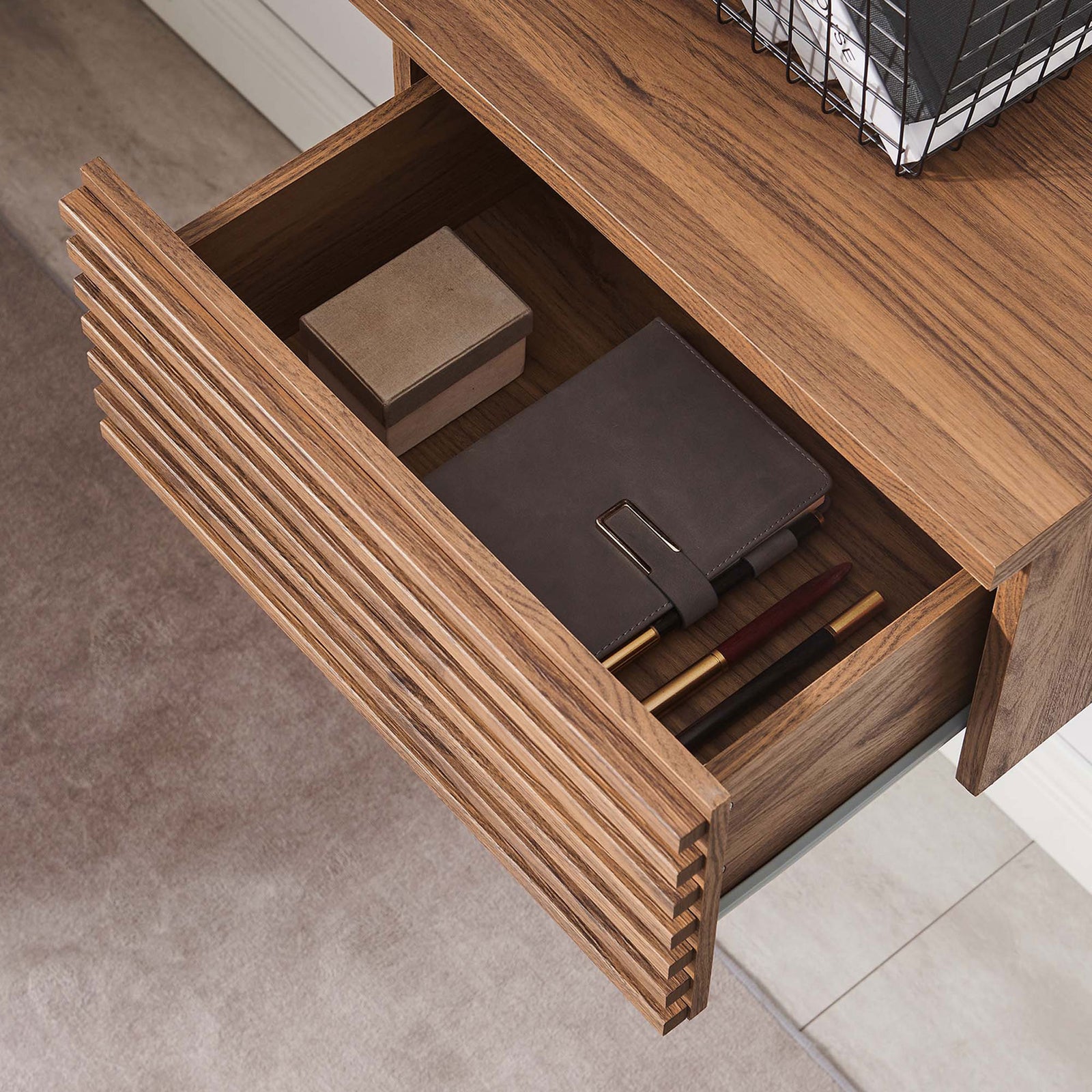 Drawer stores notebooks and accessories within easy reach in a modern workspace || EEI-6181-WAL || storage_open_room