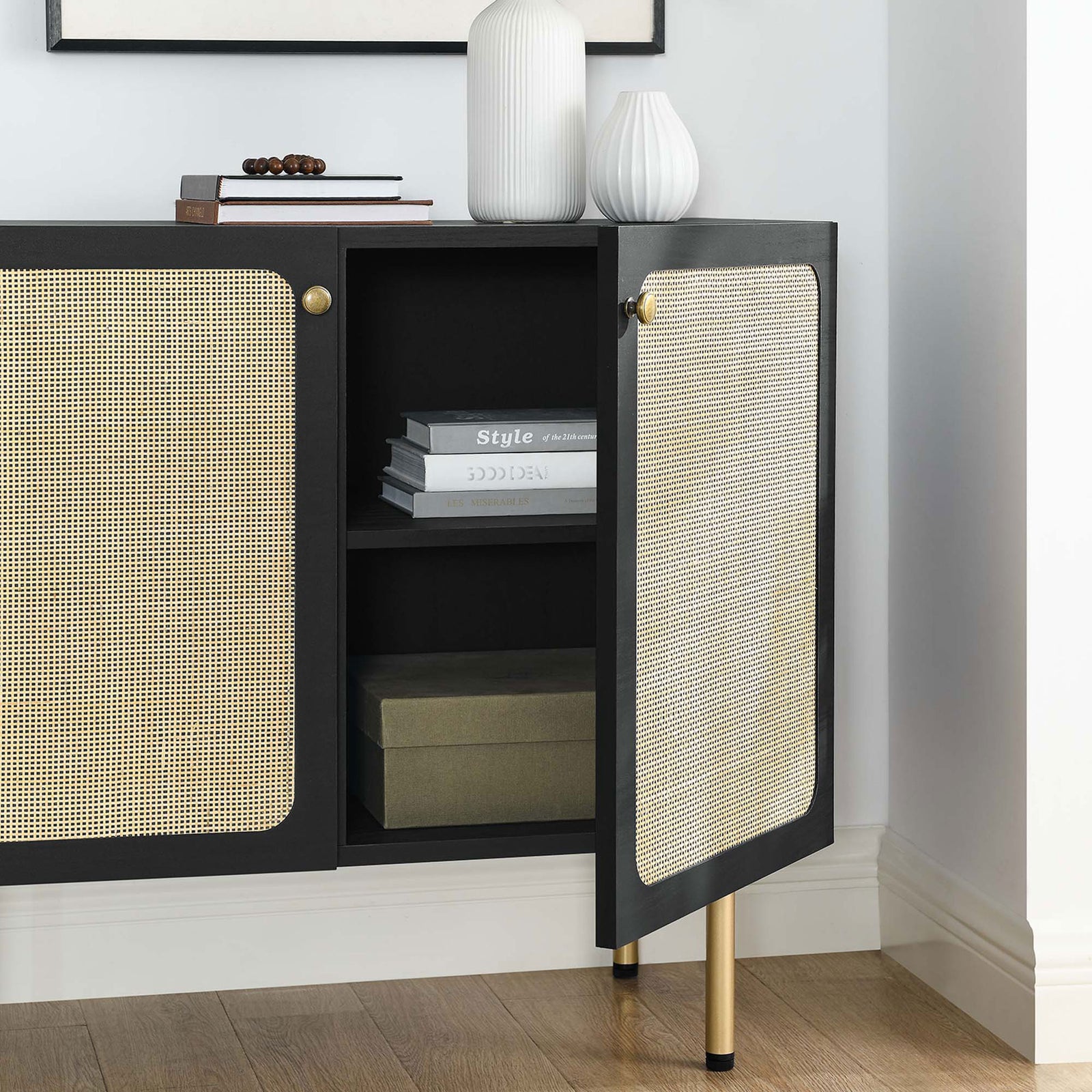 Open black cabinet in a modern room scene showcasing rattan doors and roomy interior shelves || EEI-6200-BLK || storage_open_room