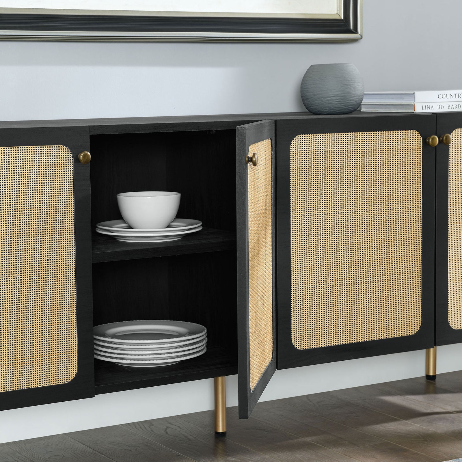 Chaucer sideboard styled in a modern living room with open doors revealing dishware storage || EEI-6201-BLK || front_angle_open_room