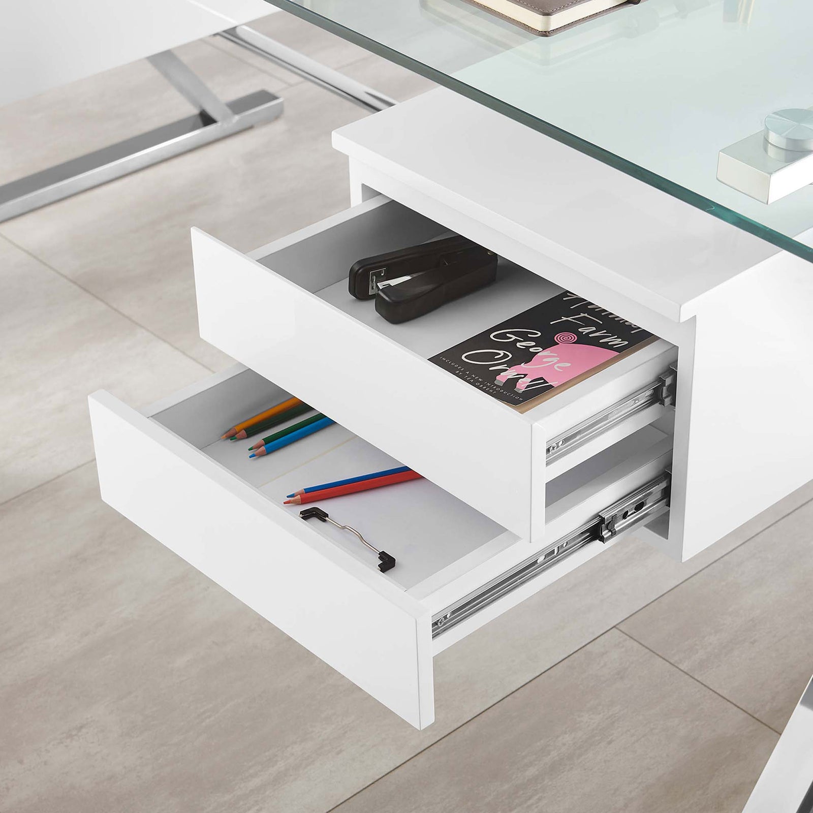 Smooth, full-extension drawers neatly store notebooks, pens, and small devices || EEI-6226-WHI || storage_open_room