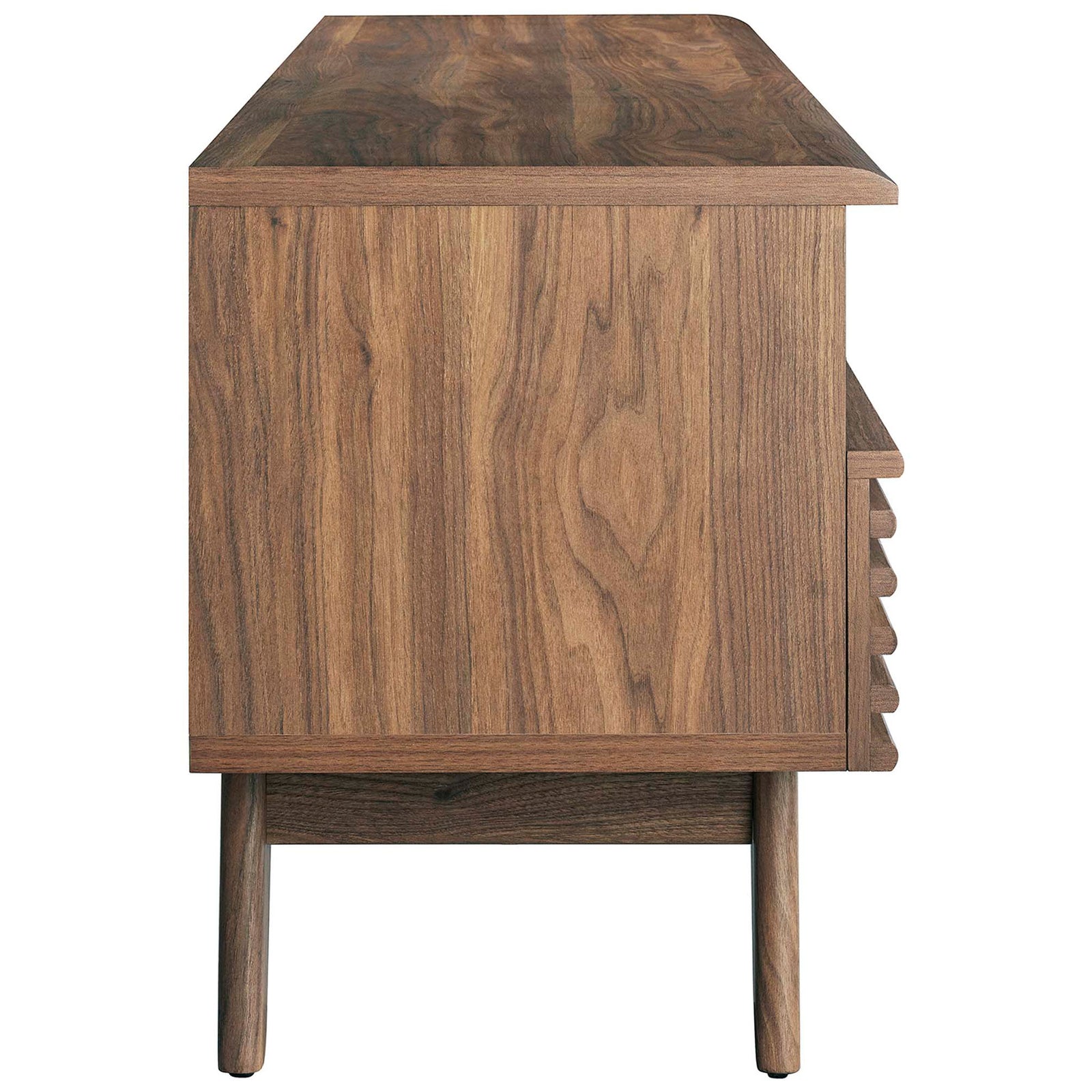 Walnut TV stand showing smooth side panel, open cubby, and angled tapered legs || EEI-6228-WAL || side_studio
