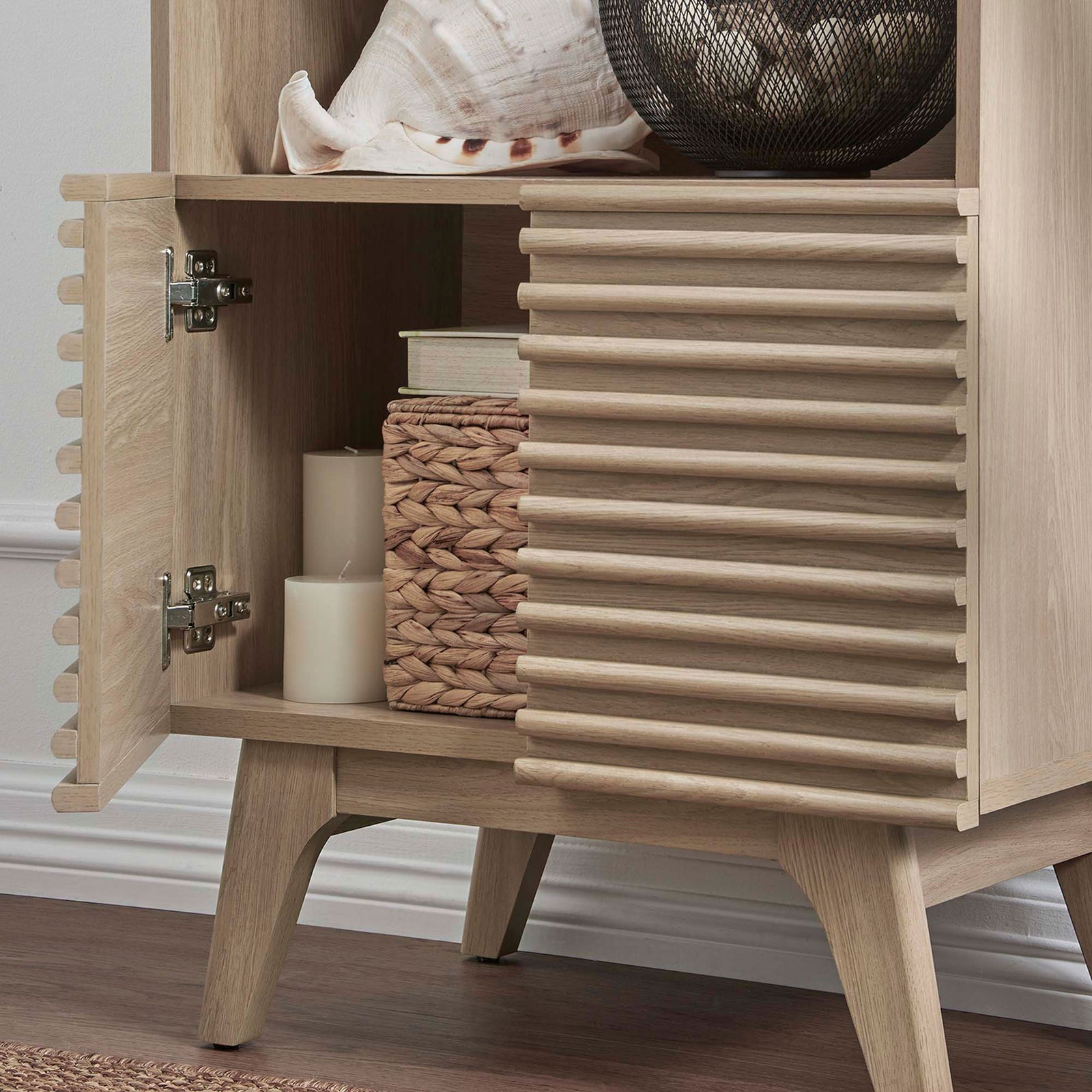 Showcases hidden storage for everyday essentials with a smooth oak finish || EEI-6229-OAK || storage_open_room