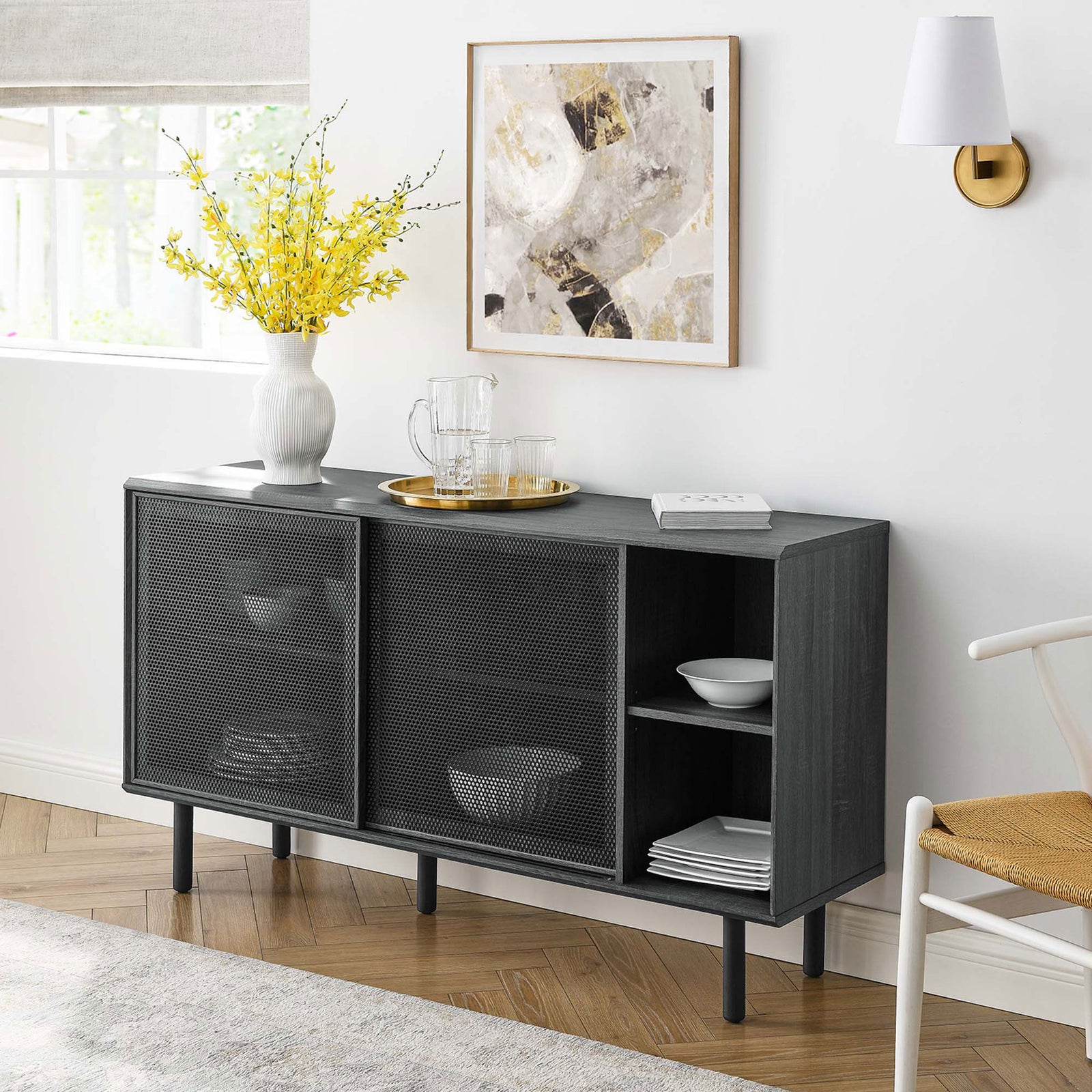 Charcoal sideboard styled with vase, tray, and artwork for a bright modern living room || EEI-6235-CHA || front_angle_room