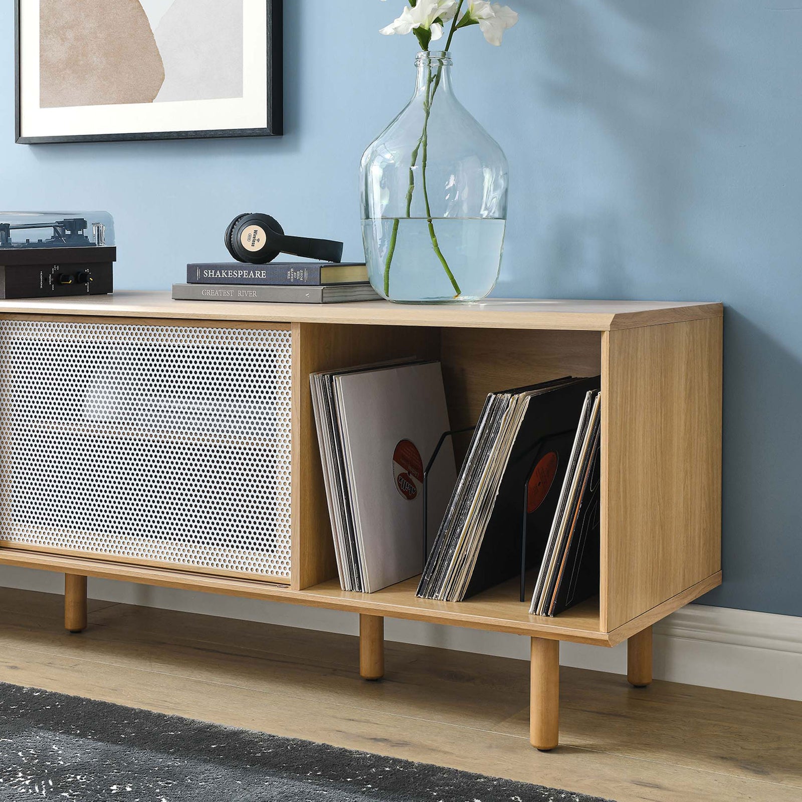 Oak record stand styled with albums and decor, emphasizing bright vinyl display and open storage || EEI-6236-OAK || detail_room