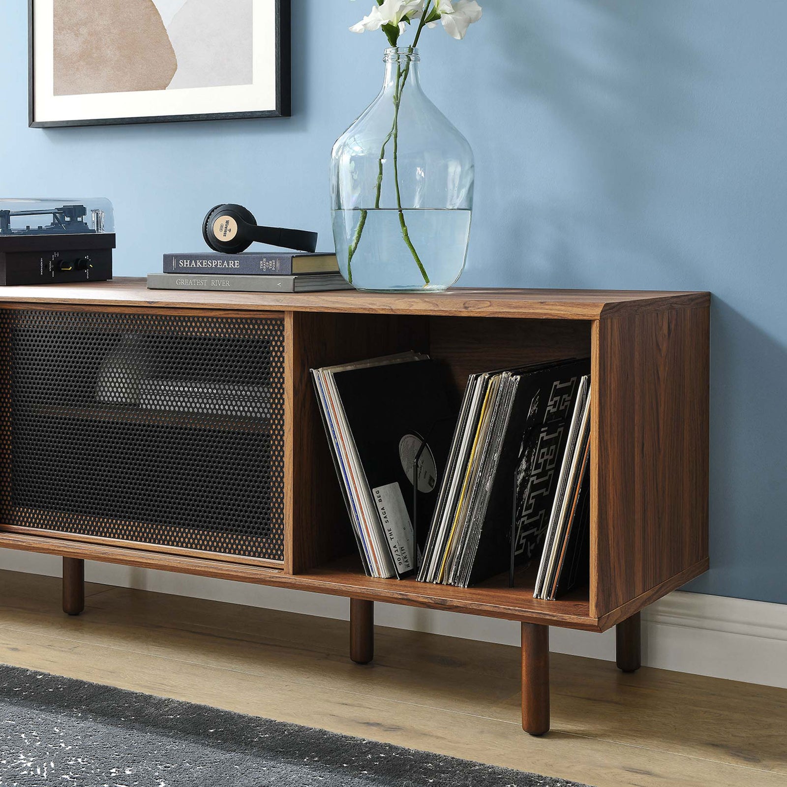 Walnut record stand styled with albums and decor, emphasizing rich wood tone and open vinyl storage || EEI-6236-WAL || detail_room