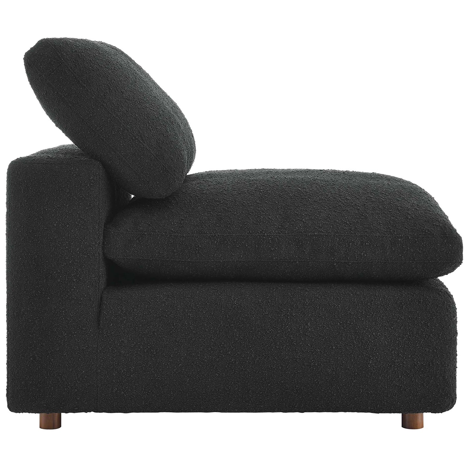 Low-profile silhouette with generously padded seat and back cushions in textured black boucle || EEI-6257-BLK || side_studio