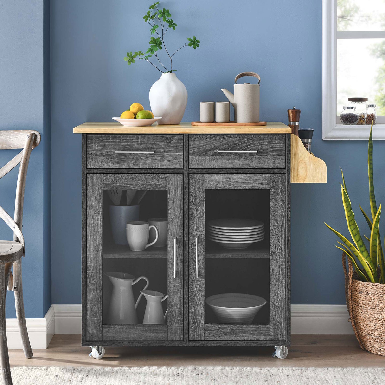 Charcoal natural kitchen cart styled as a serving station with decor, dishes, and plants in a bright dining nook || EEI-6276-CHA-NAT || front_room