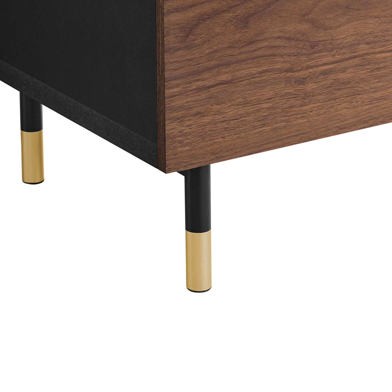 Gold-capped tubular metal legs and black base detail add a refined modern touch to the black walnut cabinet || EEI-6283-BLK-WAL || leg_studio