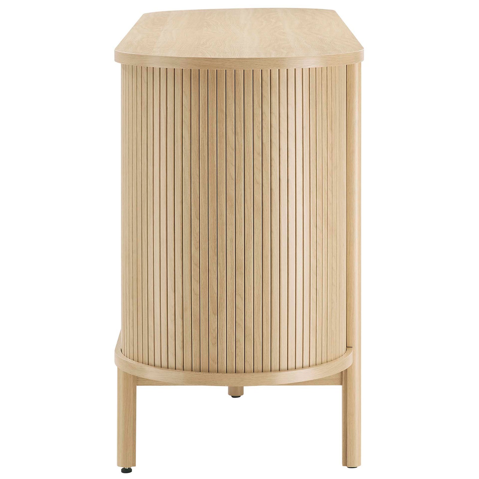 Oak sideboard with a slim, curved silhouette and vertical fluted detailing along the sides. || EEI-6309-OAK || side_studio