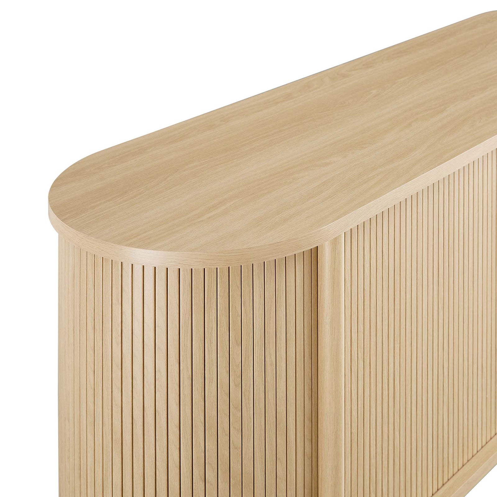 Smooth oak top with rounded edge, emphasizing the sideboard's gentle curves and flowing form. || EEI-6309-OAK || detail_studio
