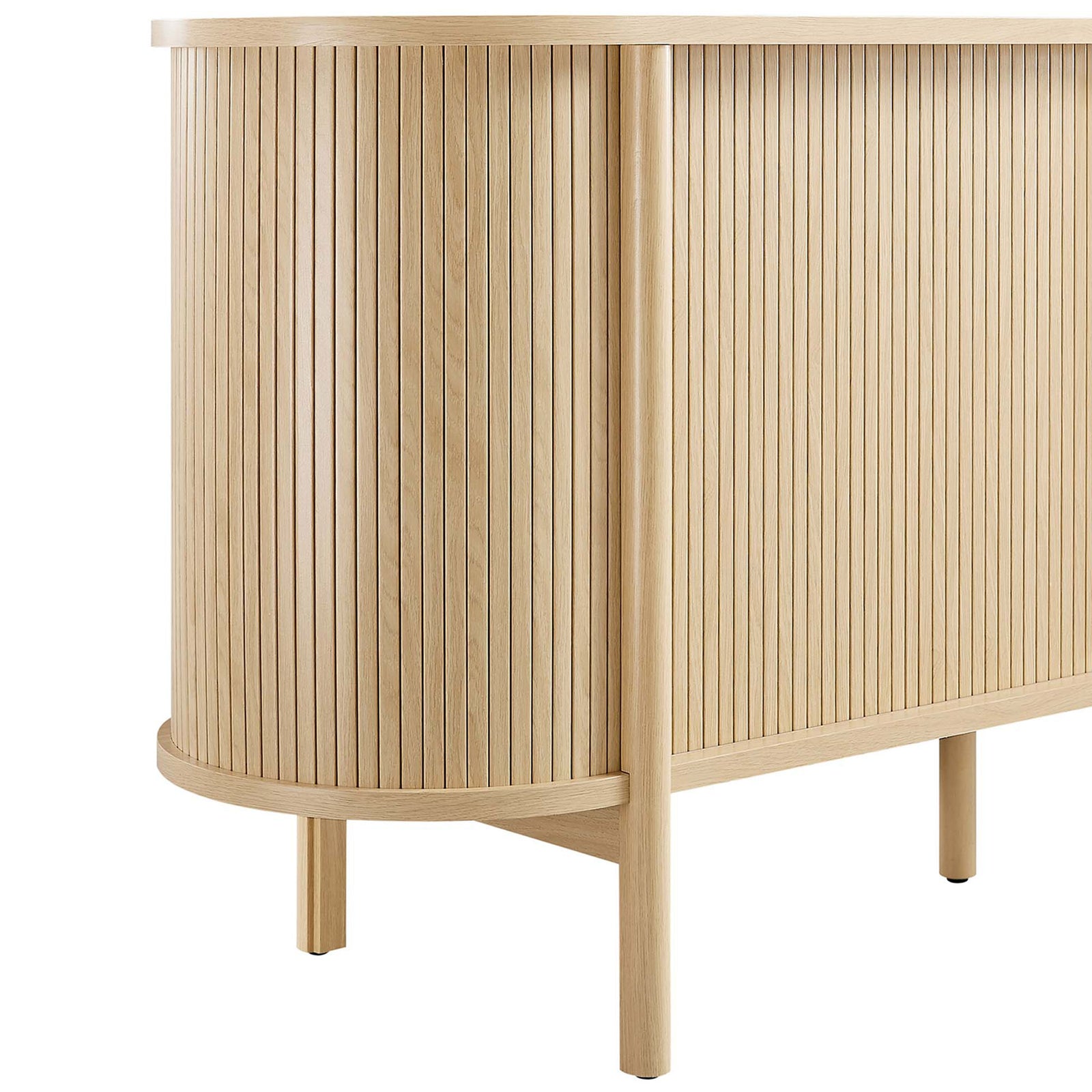 Fluted oak panels and slim round legs create rhythmic texture and a light, airy presence. || EEI-6309-OAK || detail_studio