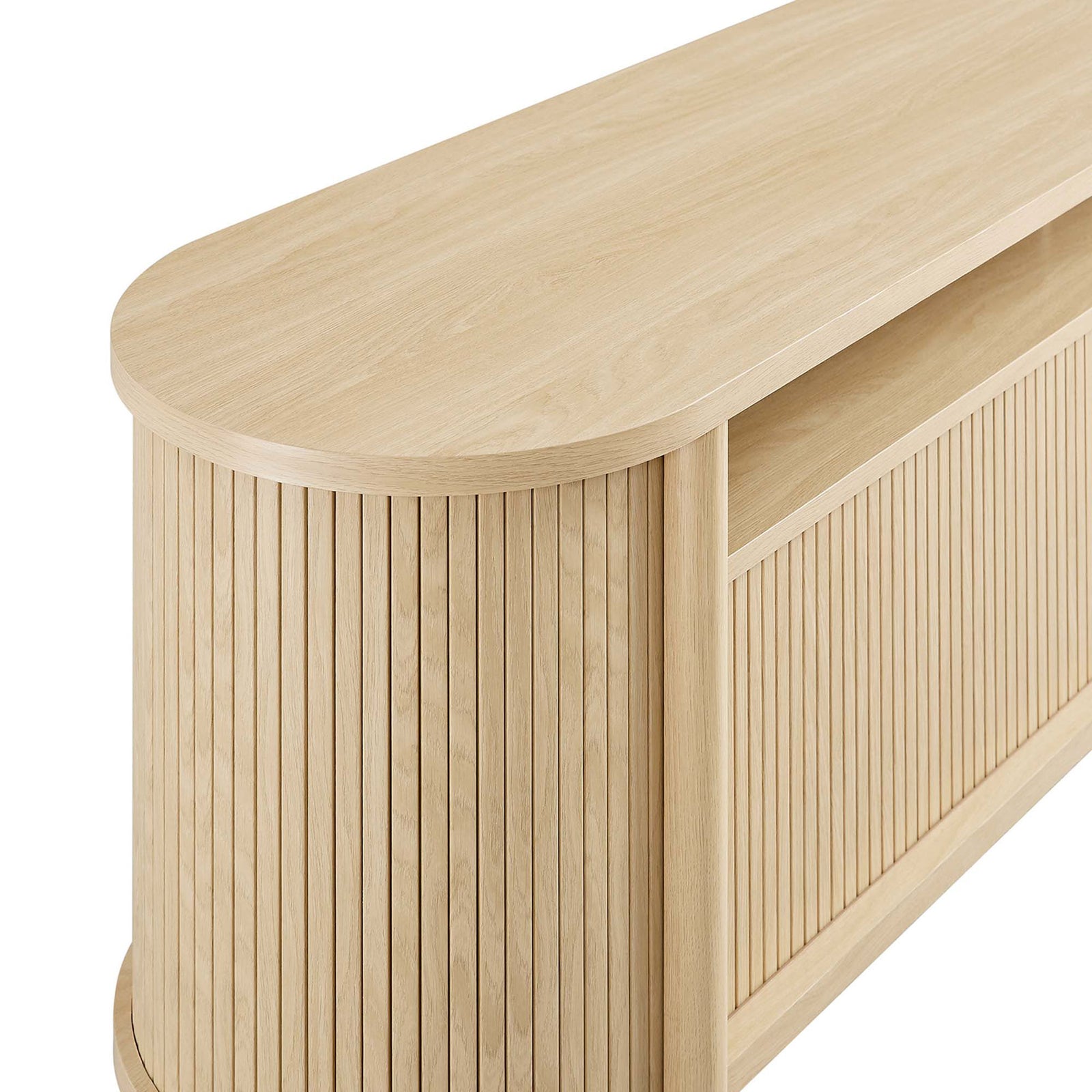Smooth oak tabletop and curved edge of the Cadence TV stand for a soft, modern look. || EEI-6310-OAK || detail_studio