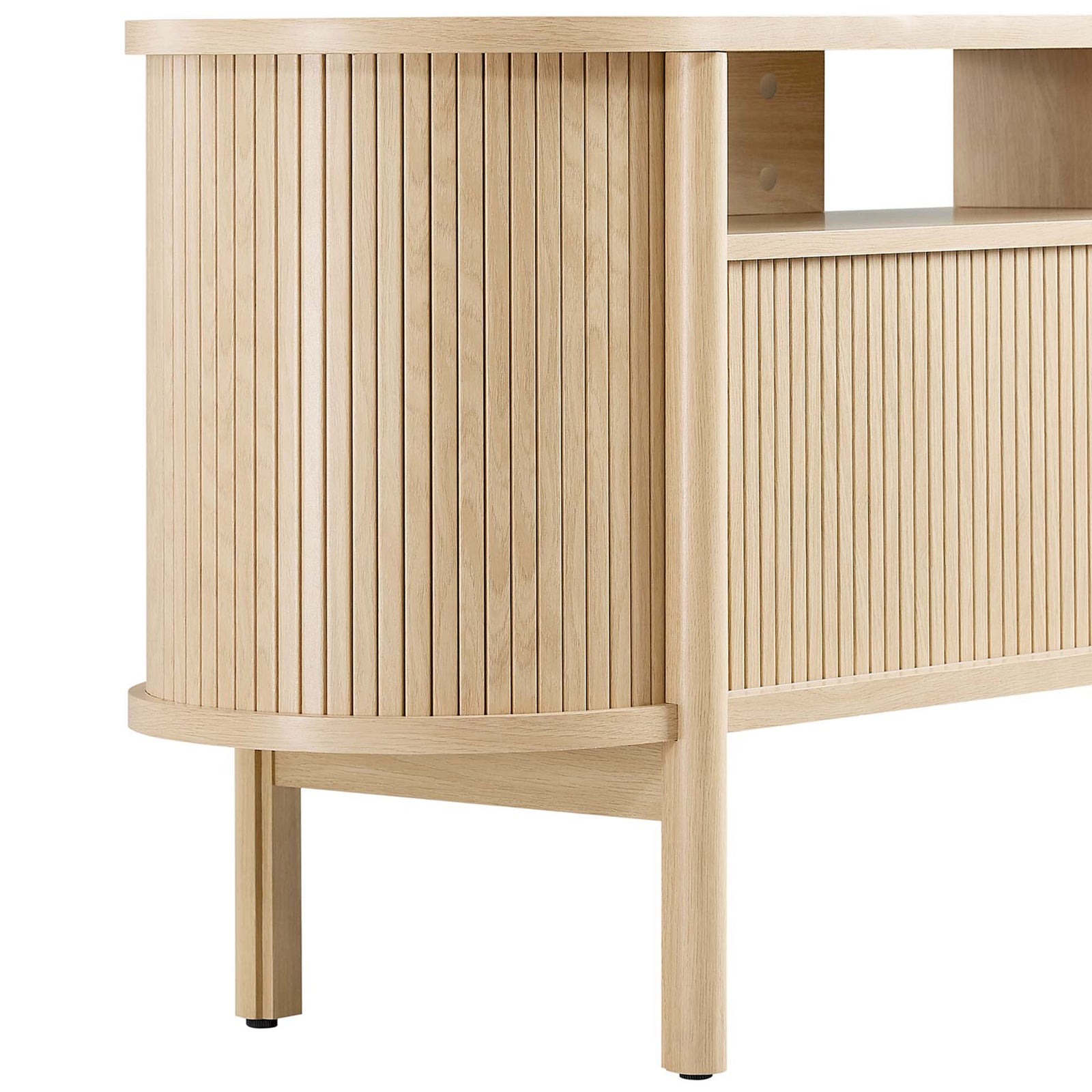 Rounded oak leg and base of the Cadence TV stand emphasizing sturdy elevated design. || EEI-6310-OAK || leg_studio