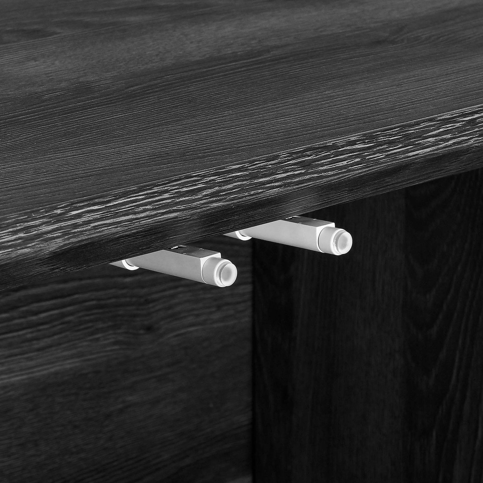 Push-to-close hardware on the sideboard keeps the chevron doors sleek and handle-free || EEI-6336-BLK || detail_studio