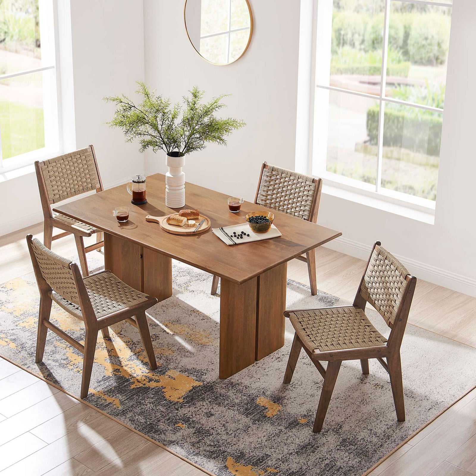 Dining room scene with 60 inch Amistad table set for coffee and snacks on a patterned rug || EEI-6338-WAL || top_angle_room