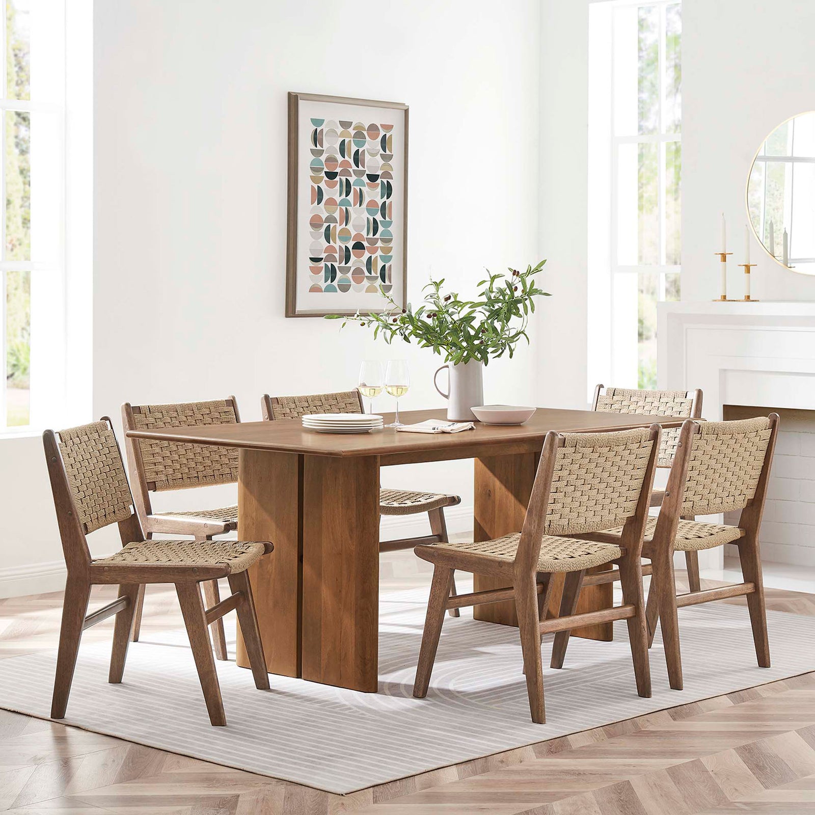 Amistad 72 inch dining table arranged with six woven chairs in a bright contemporary dining room || EEI-6339-WAL || front_room