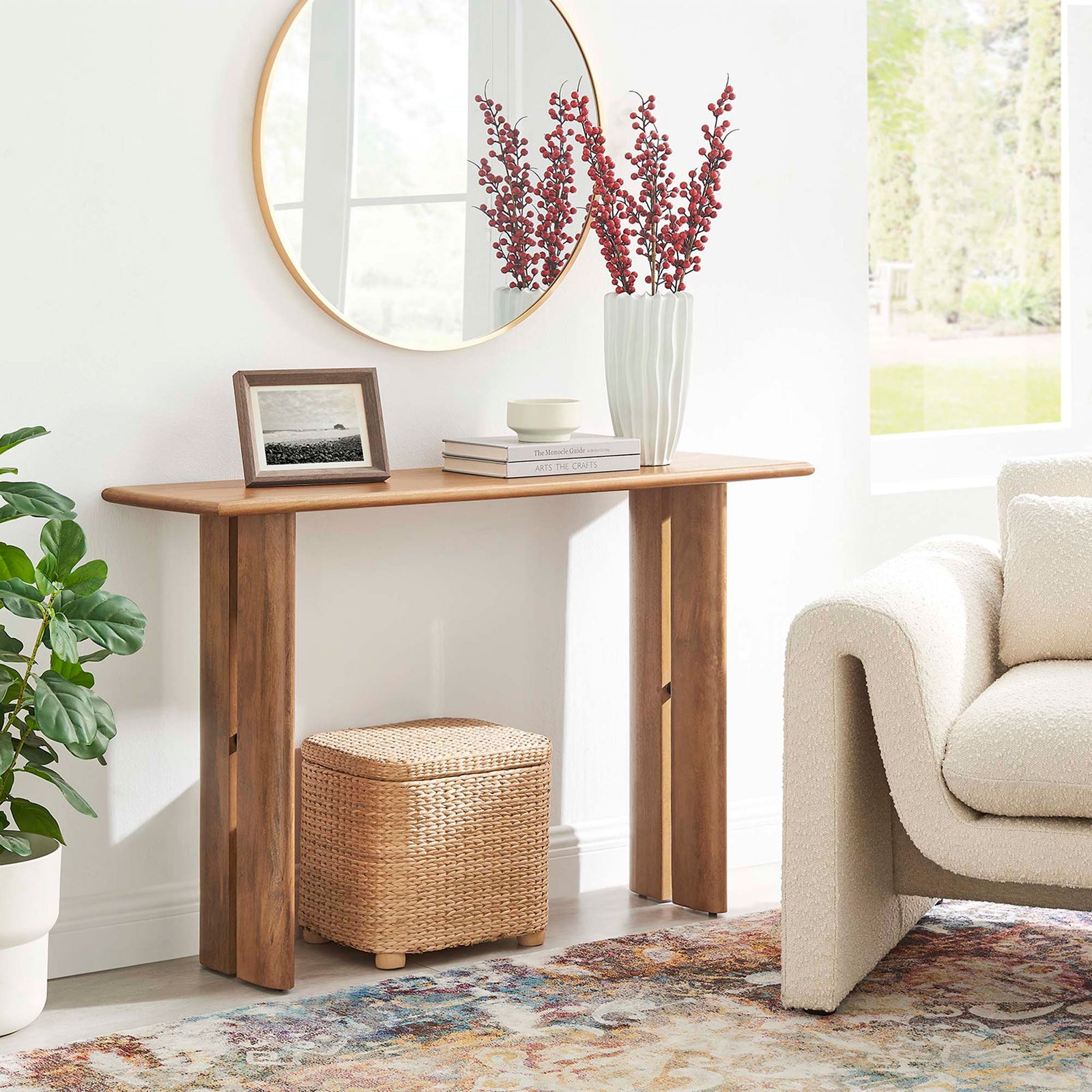 Walnut console elevates an entry with airy split legs and a spacious surface for decor. || EEI-6342-WAL || front_angle_room