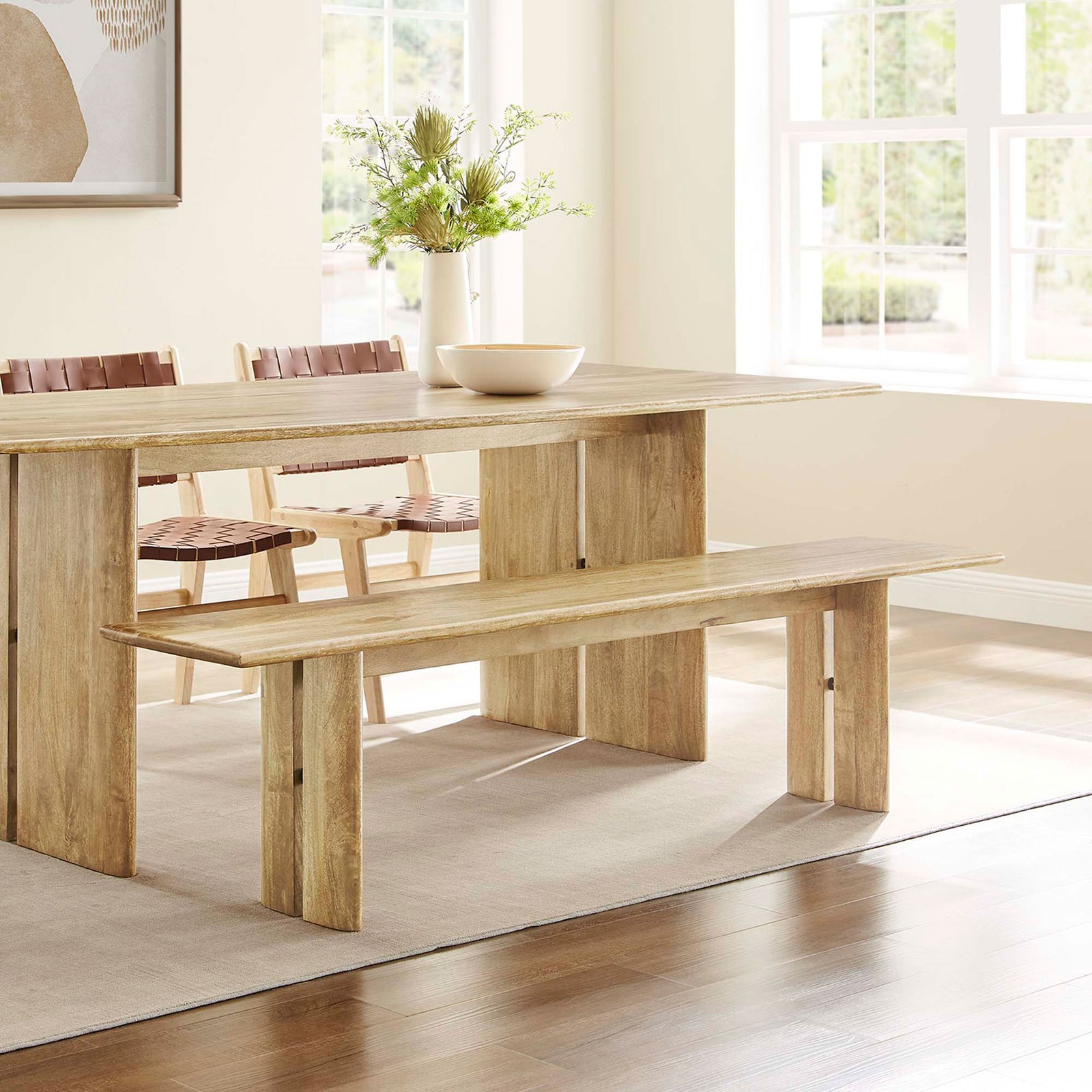Generous seating anchors a welcoming dining setting with organic warmth. || EEI-6345-OAK || front_angle_room