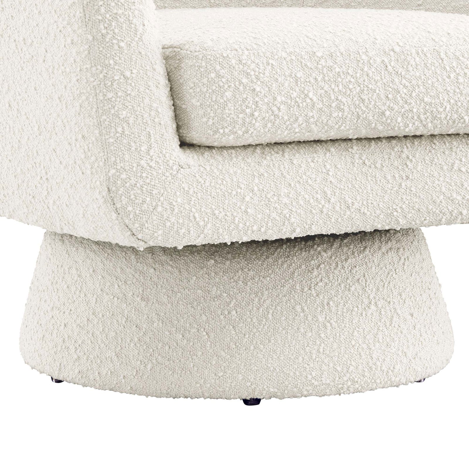 Tapered pedestal base provides stable, seamless swivel beneath the cozy textured boucle seat || EEI-6359-IVO || leg_studio