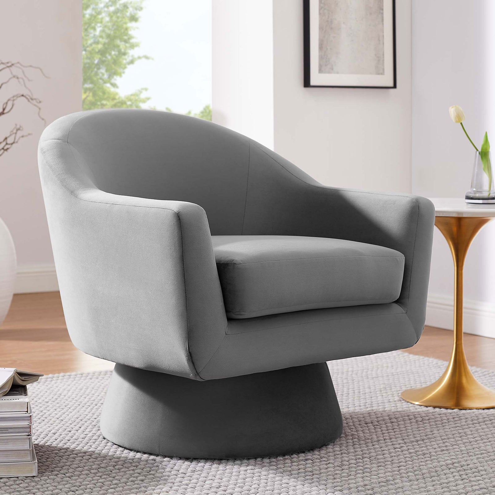 Chic gray velvet swivel chair elevates any room with smooth curves and cozy cushioning || EEI-6360-GRY || front_angle_room