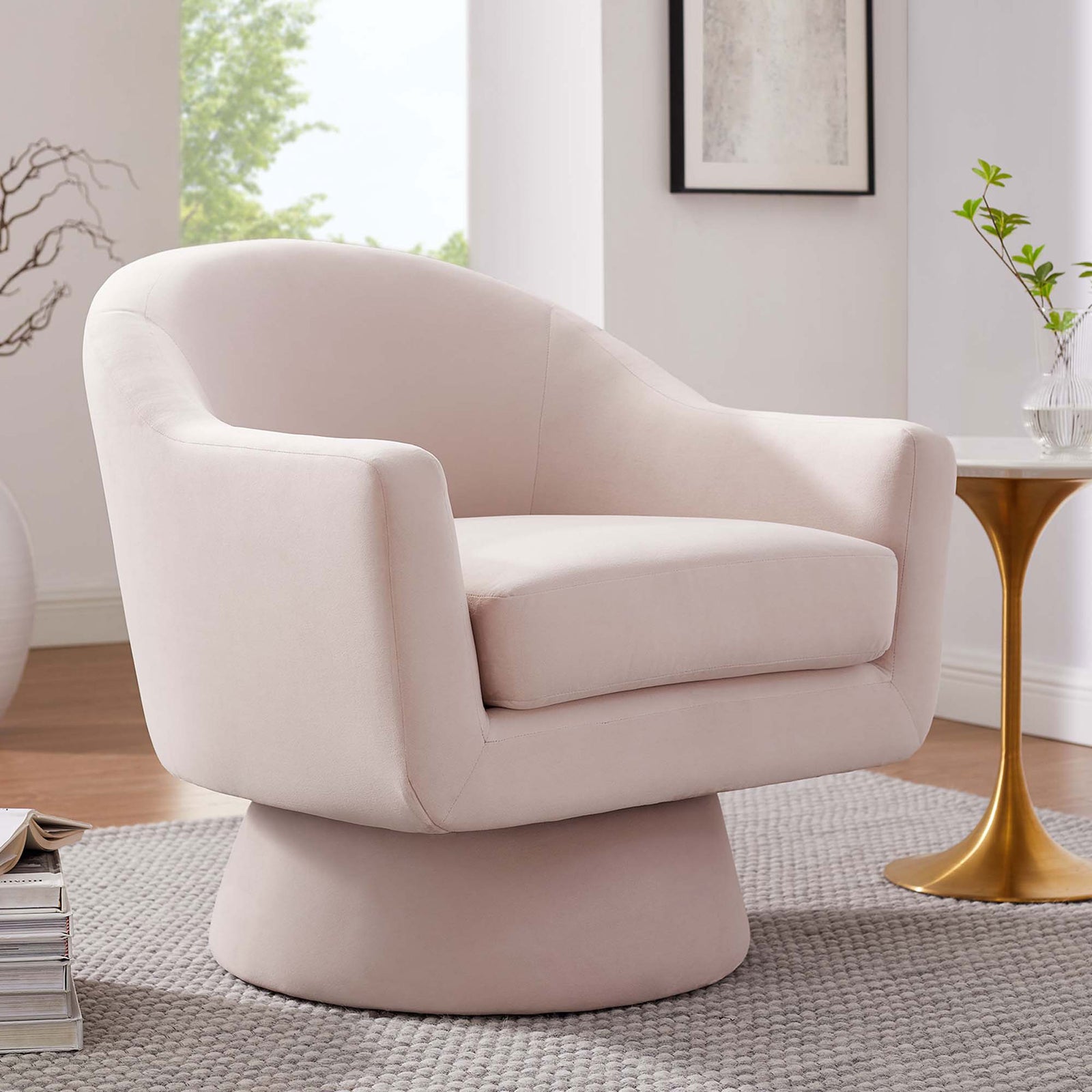 Chic swivel chair in soft pink velvet elevates the living room with inviting comfort and style || EEI-6360-PNK || front_angle_room