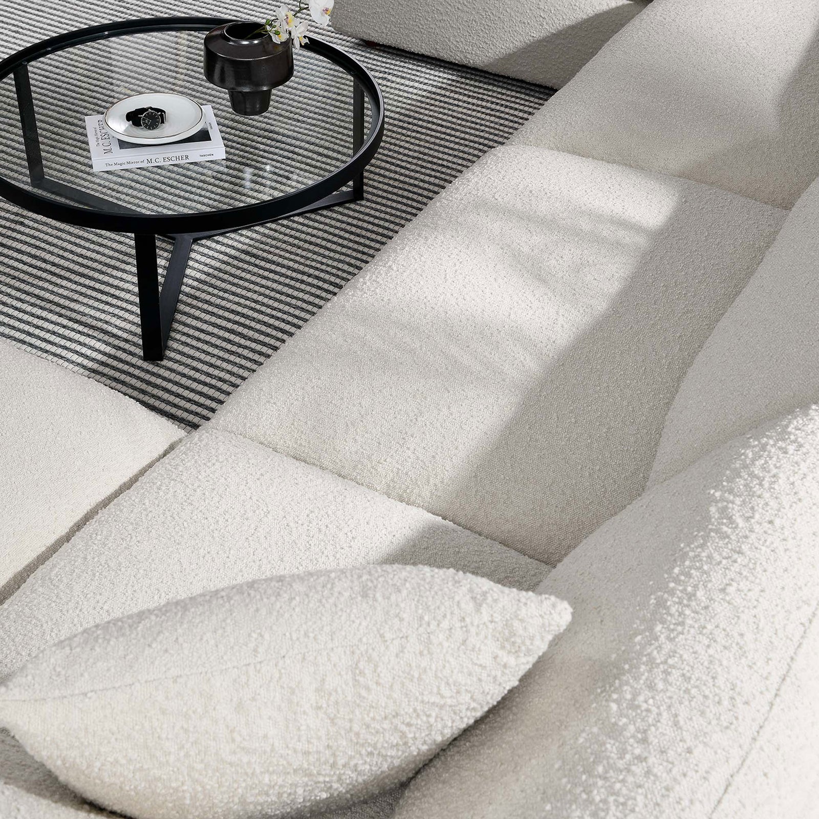 Close up of plush ivory boucle upholstery and cushions on the Commix sectional sofa || EEI-6366-IVO || swatch_room
