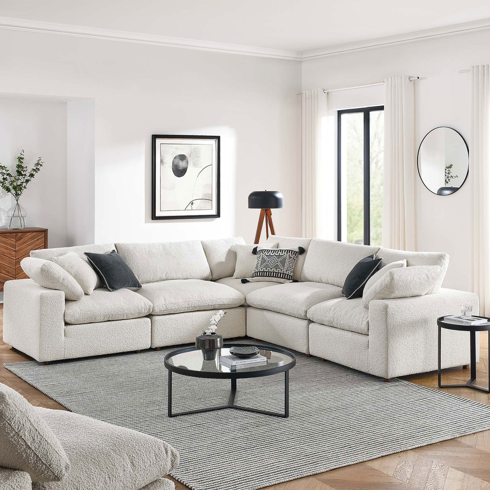 Inviting ivory boucle sectional anchors a bright living room with cozy pillows and a contemporary coffee table || EEI-6368-IVO || front_angle_room