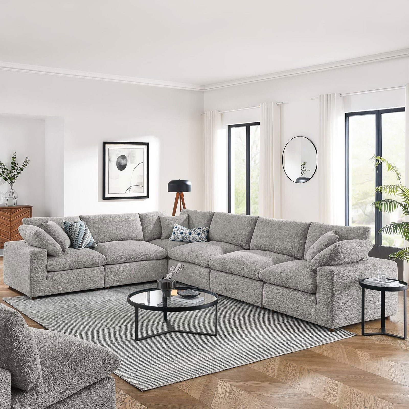Light gray boucle sectional sofa in a bright living room with modern decor, rug, and accent tables || EEI-6369-LGR || front_angle_room