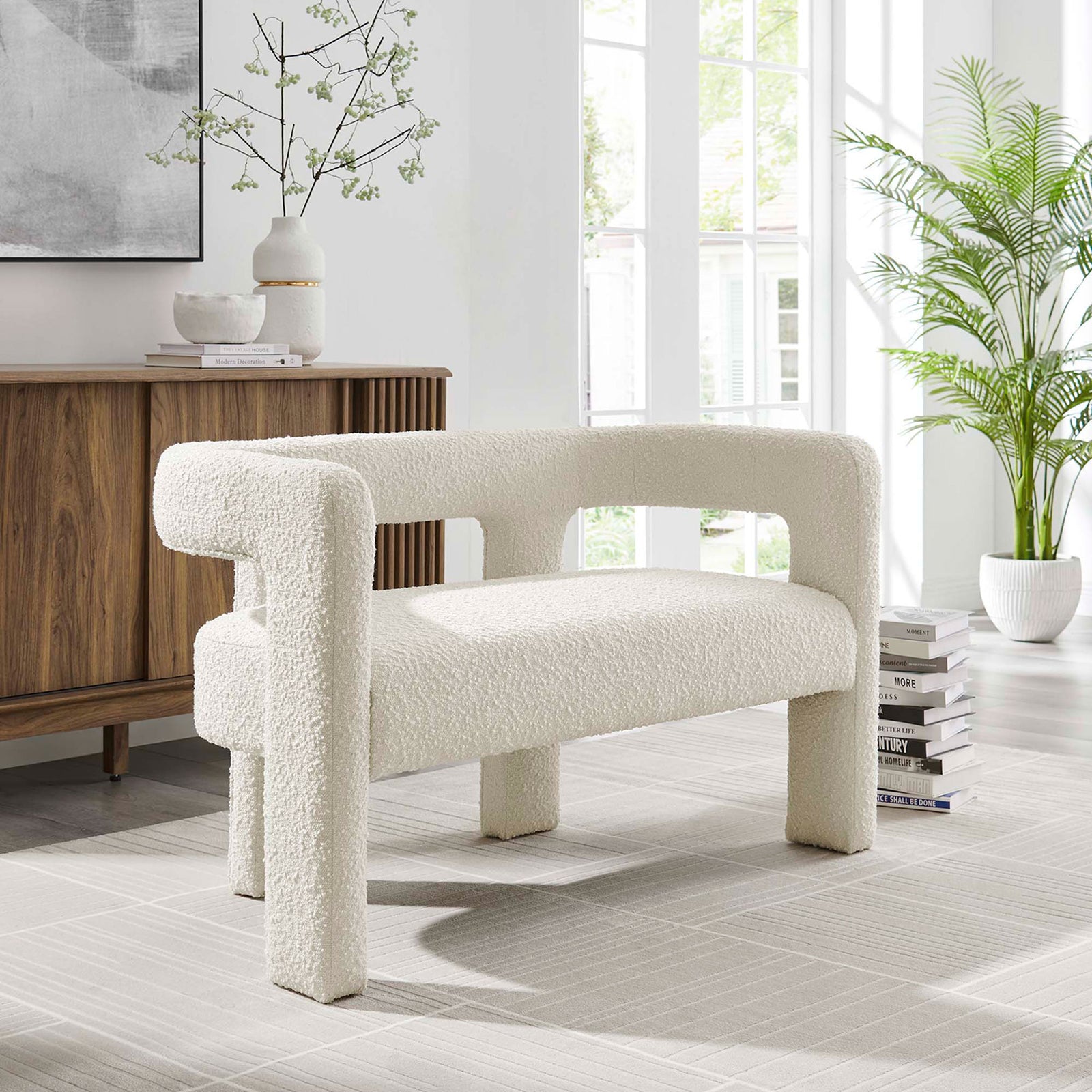 Ivory boucle loveseat styled in a bright modern room with wood accents and greenery || EEI-6477-IVO || front_angle_room