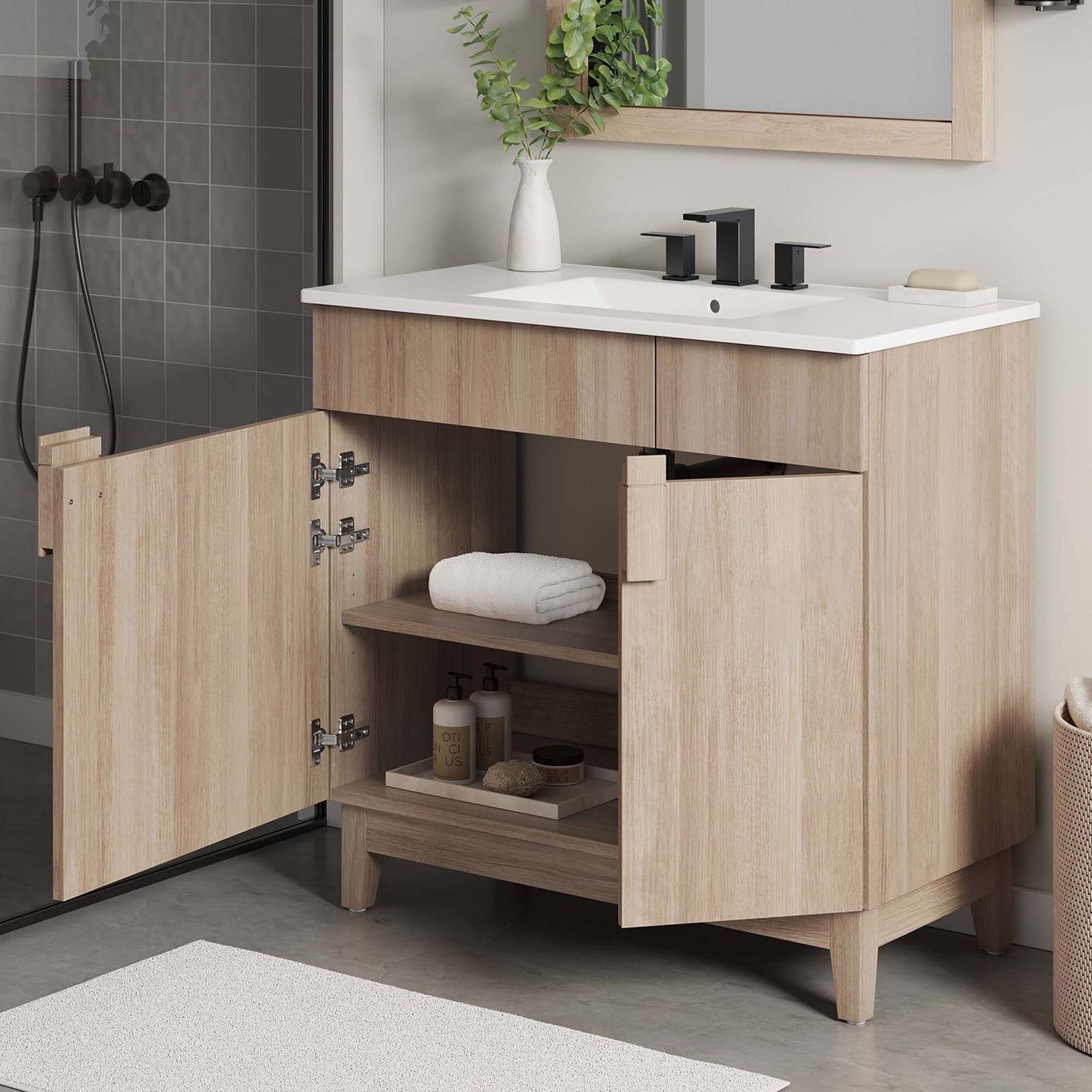 Organize towels and toiletries on interior shelves behind clean-lined doors || EEI-6484-WHI-OAK || front_angle_open_room