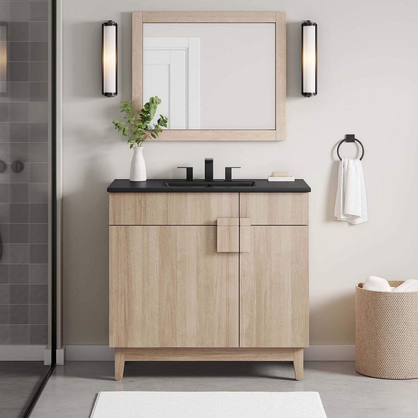 Modern 36-inch vanity with black sink enhances the bath with warm oak tones and crisp geometry. || EEI-6485-BLK-OAK || front_room