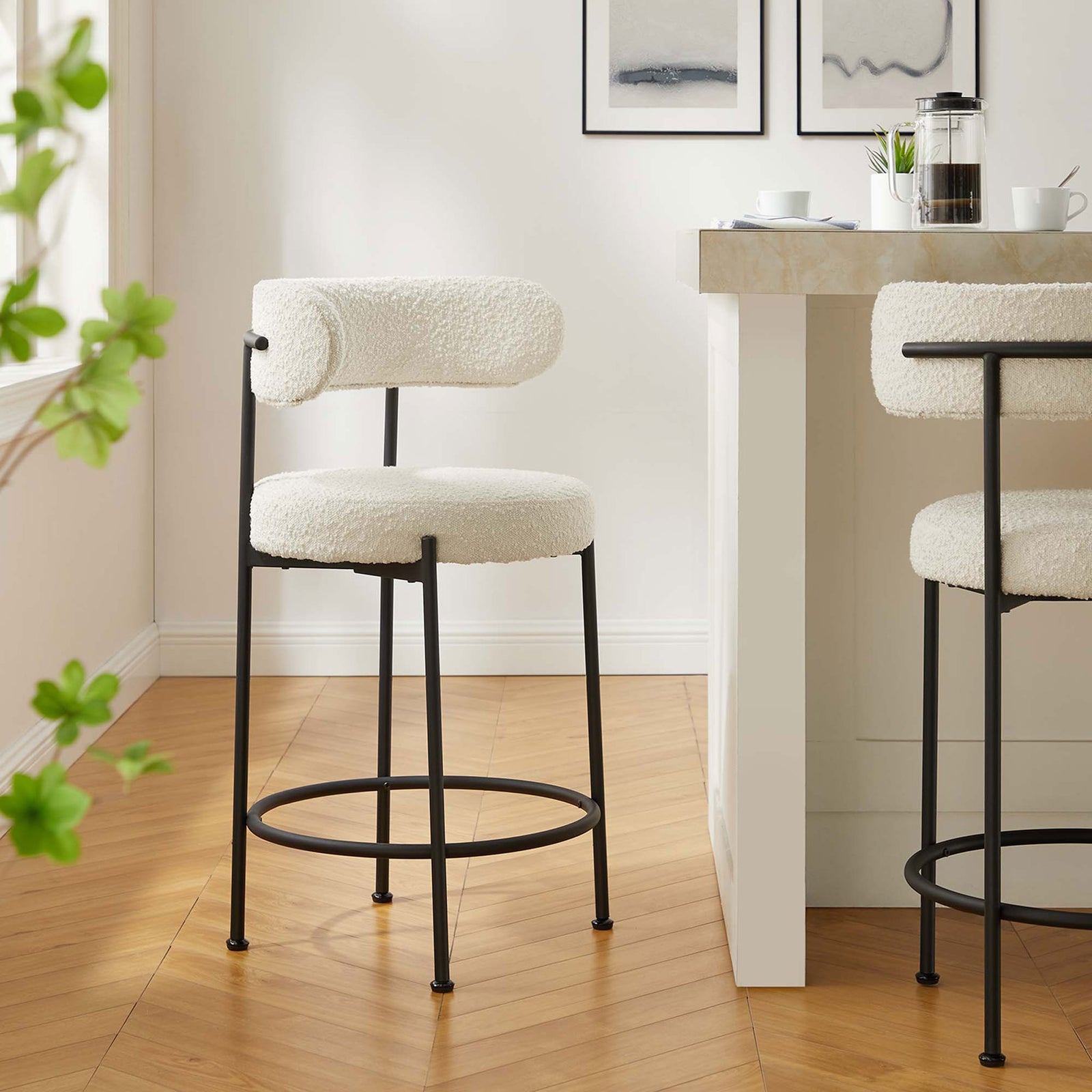 Counter stool brings cozy boucle texture and modern lines to the kitchen island. || EEI-6518-IVO-BLK || front_angle_room
