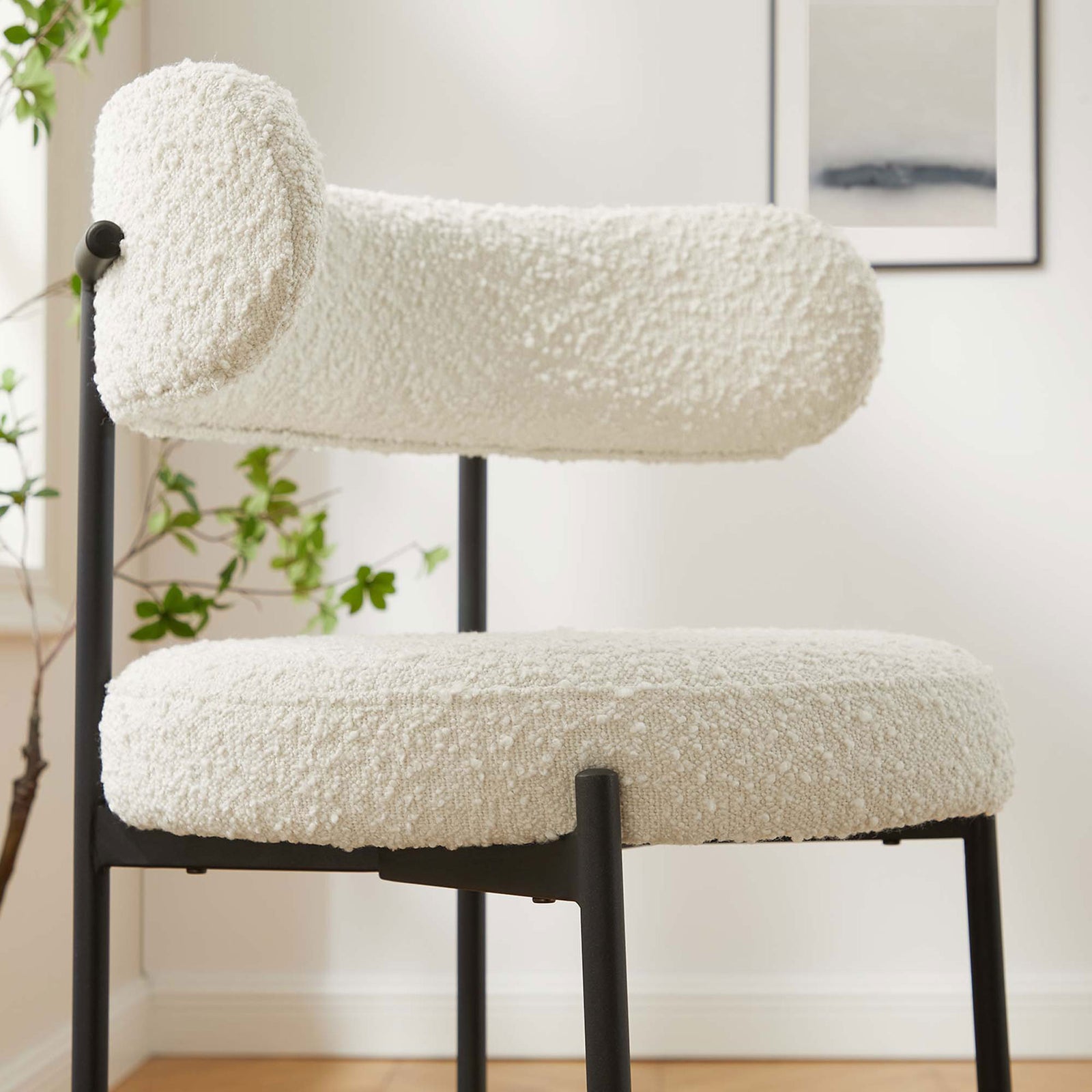 Textured ivory boucle adds soft contrast in a bright kitchen setting. || EEI-6518-IVO-BLK || detail_room
