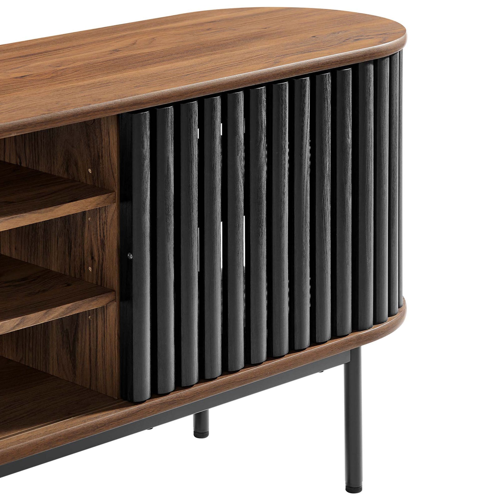 Detail of walnut media console showing smooth rounded top, black slatted doors, and slim metal leg || EEI-6522-WAL-BLK || detail_studio