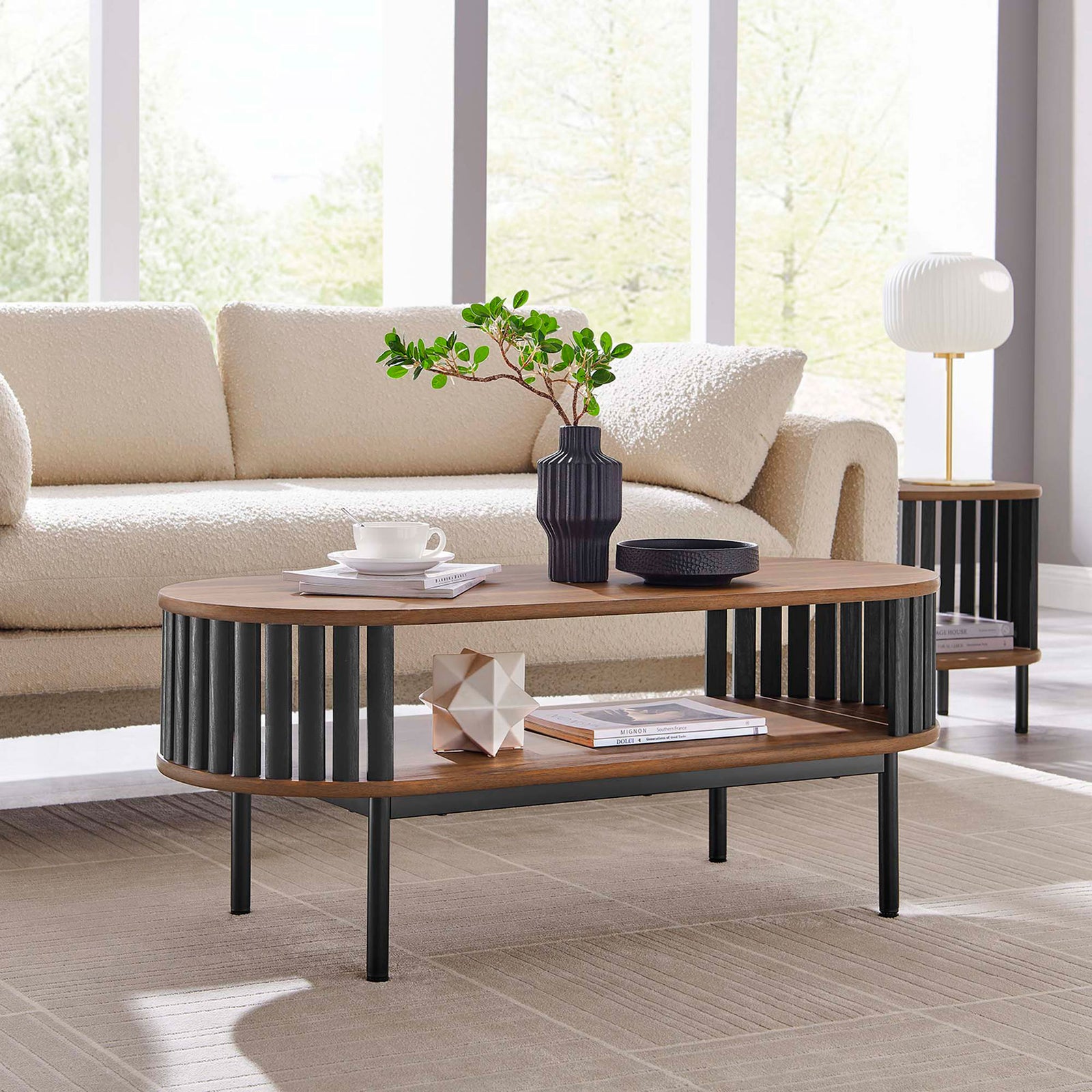 Elevates the living room with open storage and black slat sides on sturdy metal legs || EEI-6525-WAL-BLK || front_angle_room