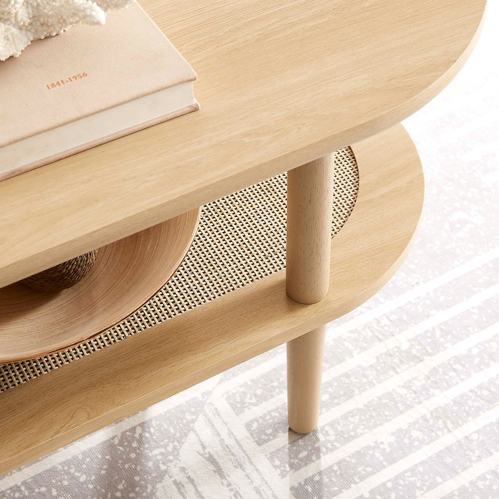 Textured rattan shelf and smooth top add natural warmth to your living space || EEI-6526-OAK || detail_room